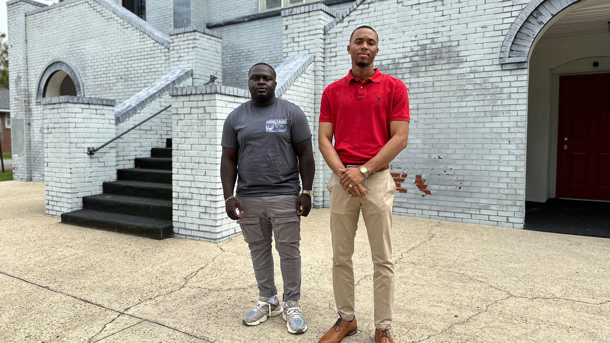 Justin Herman (right) stands outside of Mt Lebanon AME Zion Church