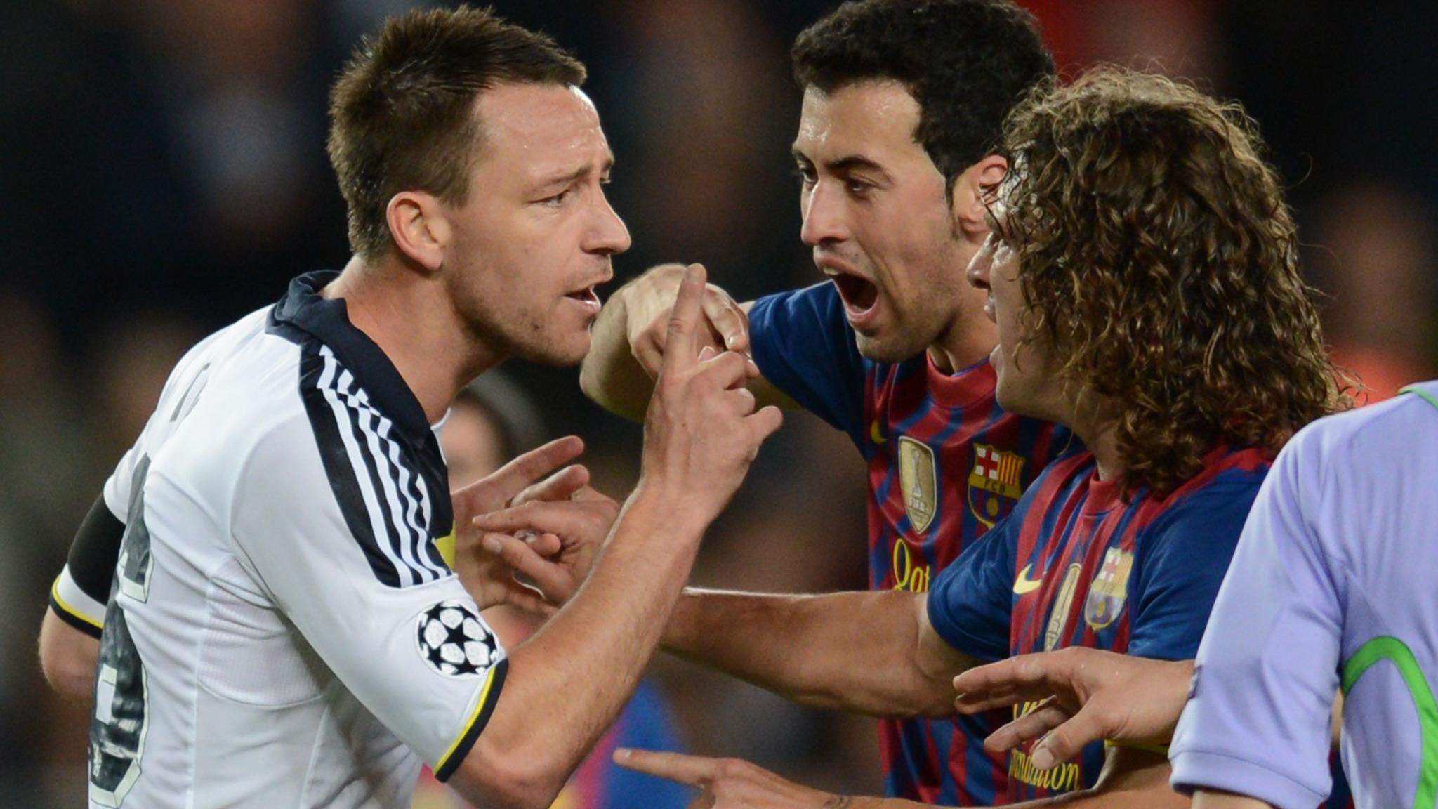 Chelsea's John Terry argues with Barcelona's Carlos Puyol and Sergio Busquets in the 2012 Champions League semi-final
