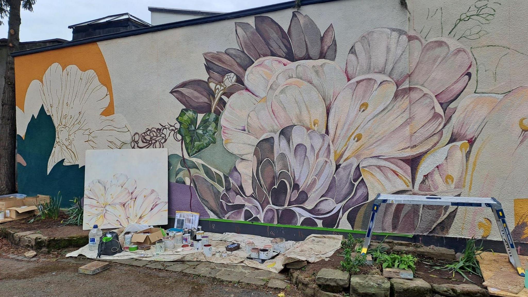 Mural depicting flowers on a wall