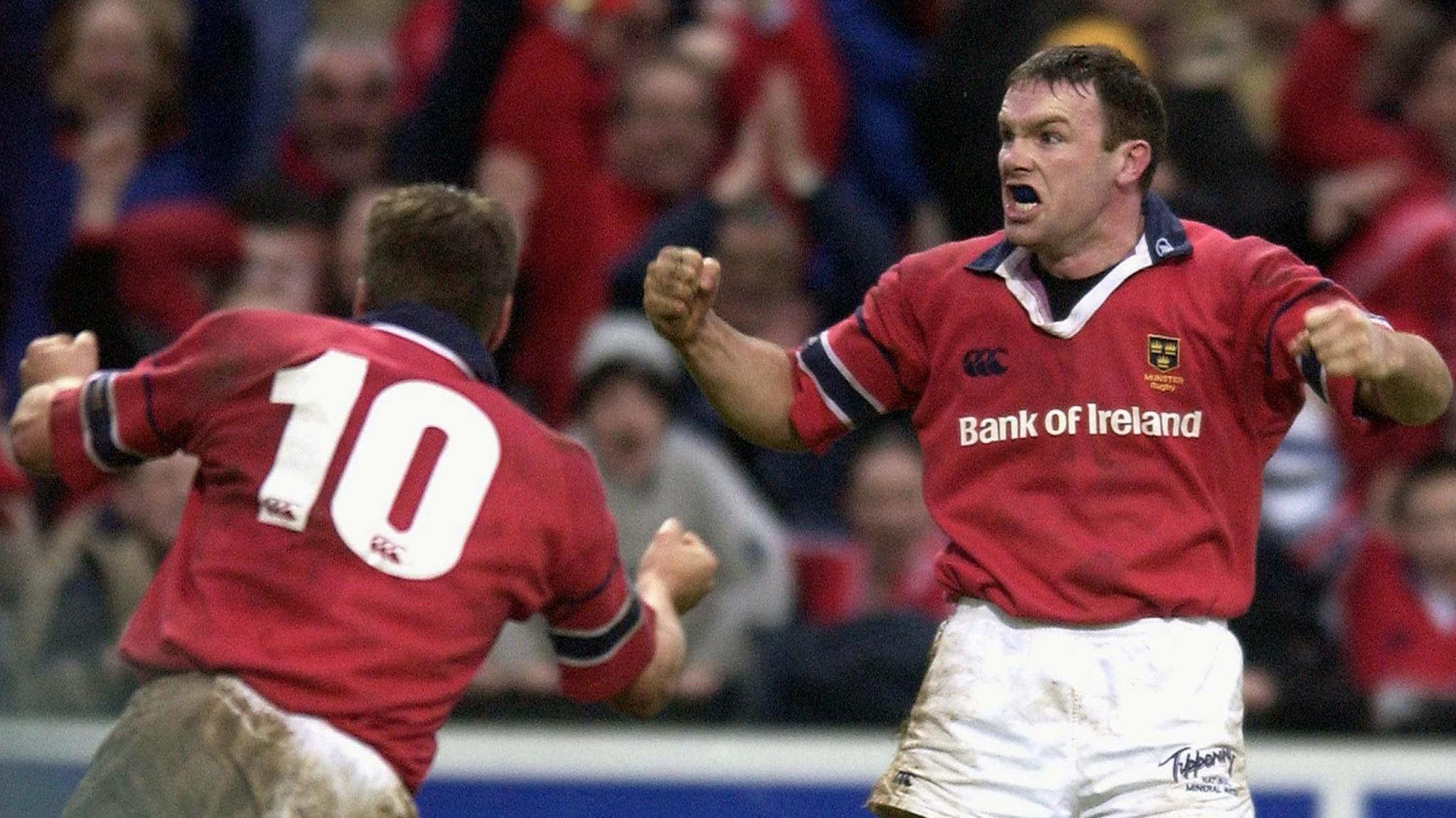 John Kelly celebrates a try with Ronan O'Gara