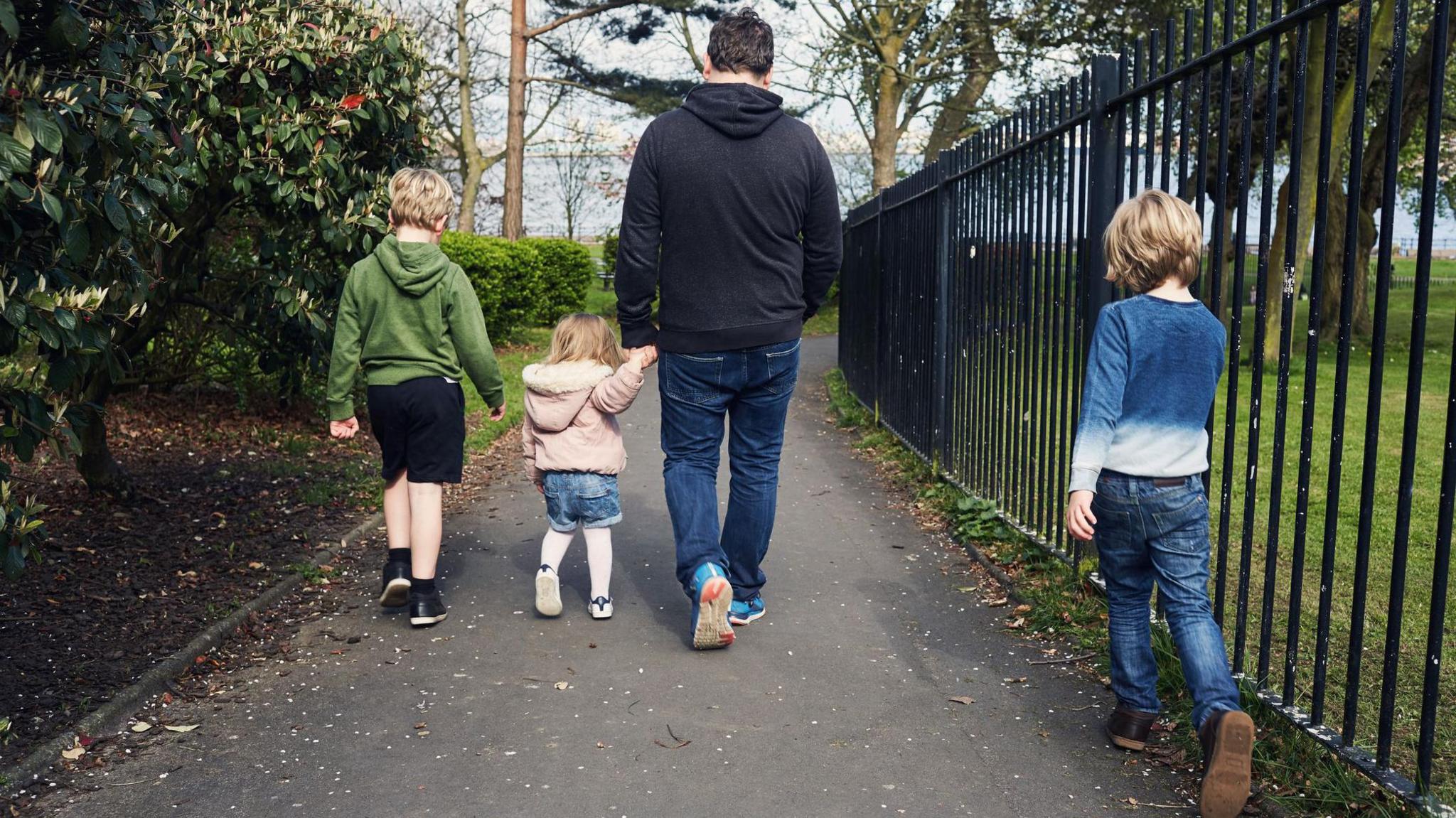 A man with three children