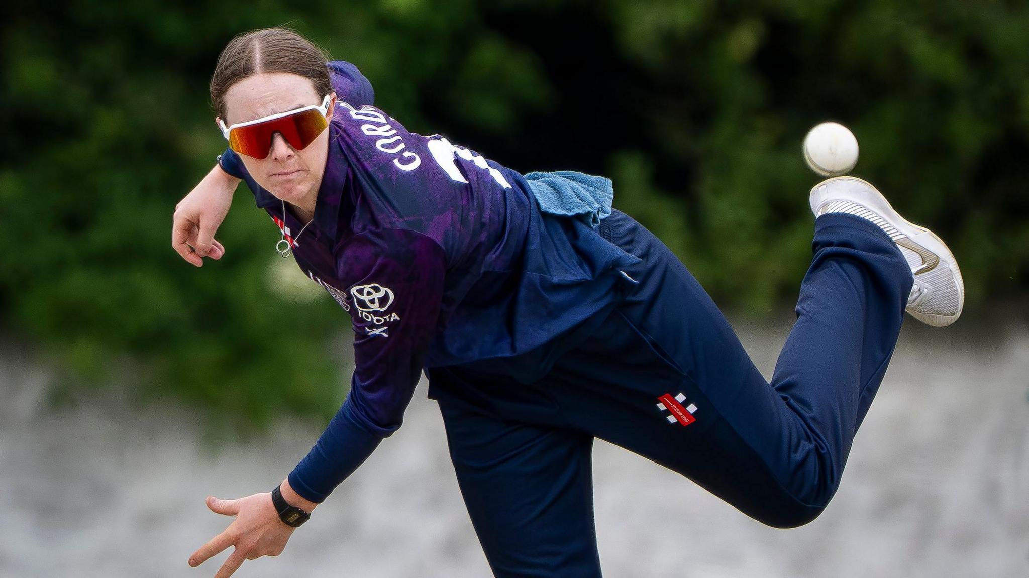 Kirstie Gordon bowling for Scotland in a T20 match against the Netherlands