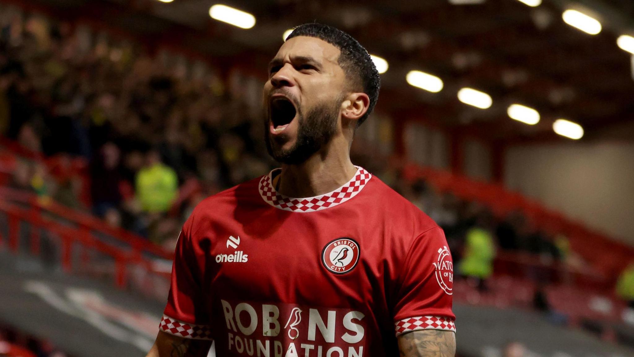 Nahki Wells shouts in celebration after scoring a goal for Bristol City