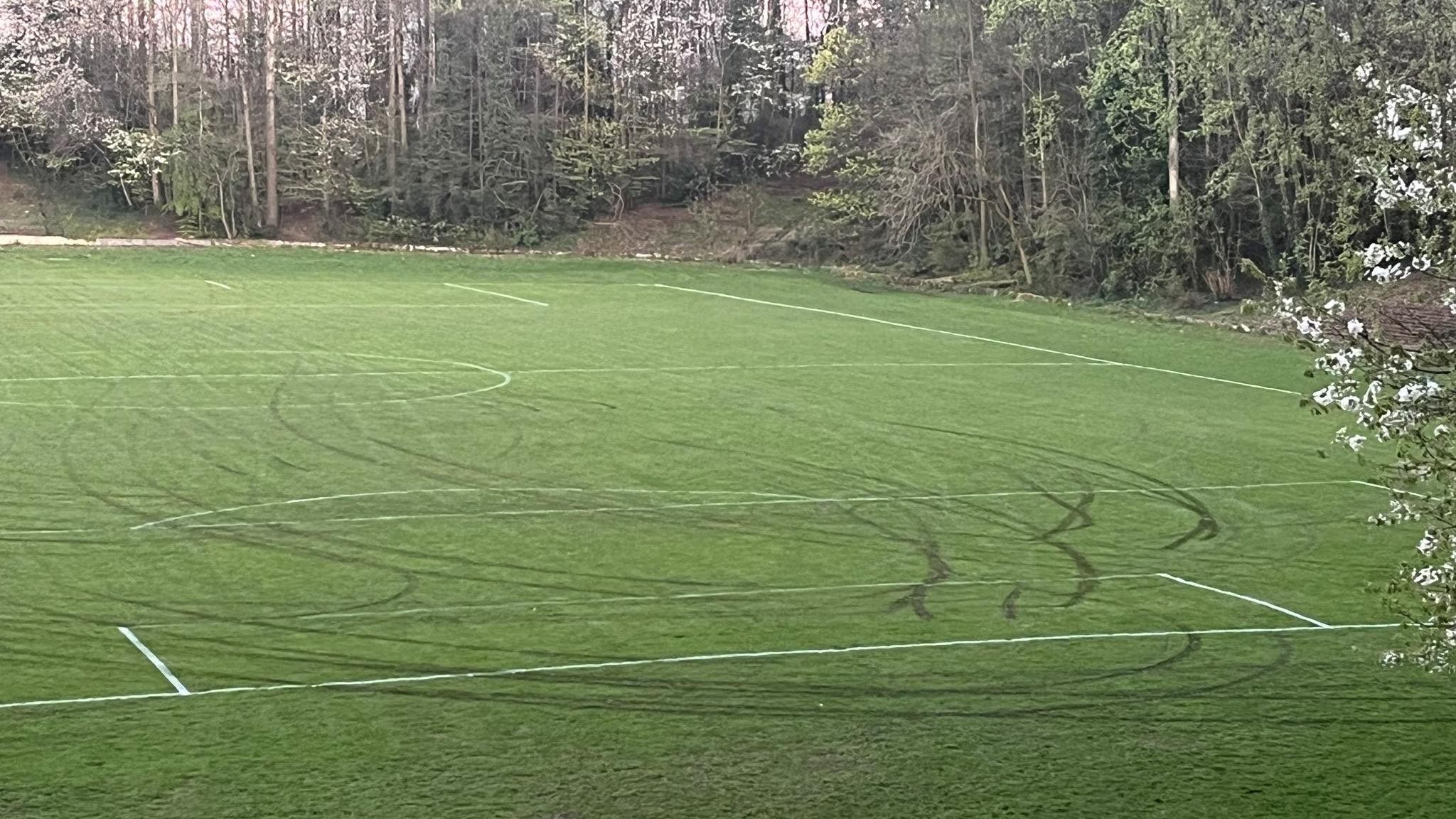 Quadbike marks over pitch