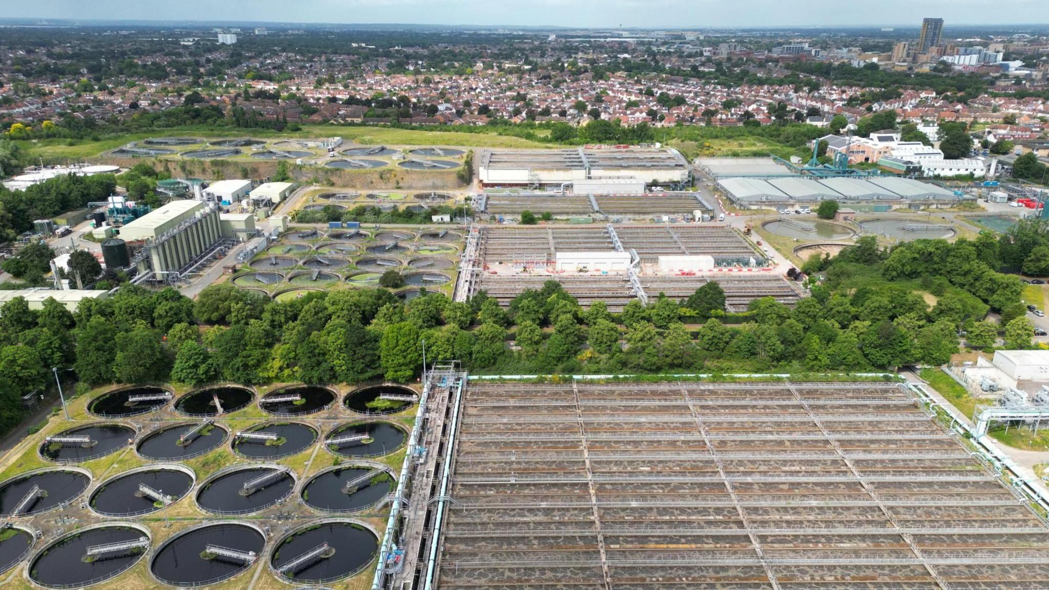 A drone view shows Mogden Sewage Treatment Works, operated by Thames Water, which processes sewage water from over two million people