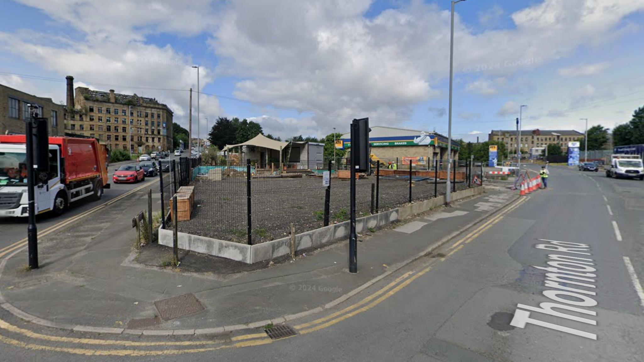 Street view image of the junction of Thornton Road and Listerhills Road, currently an empty patch of land. 