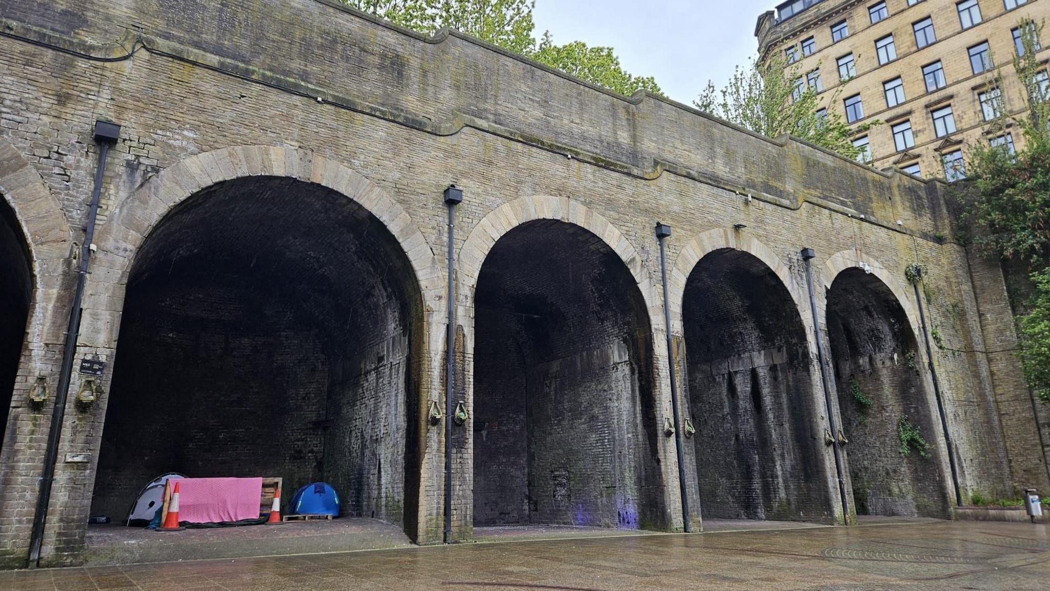 Tents underneath arches in Bradford