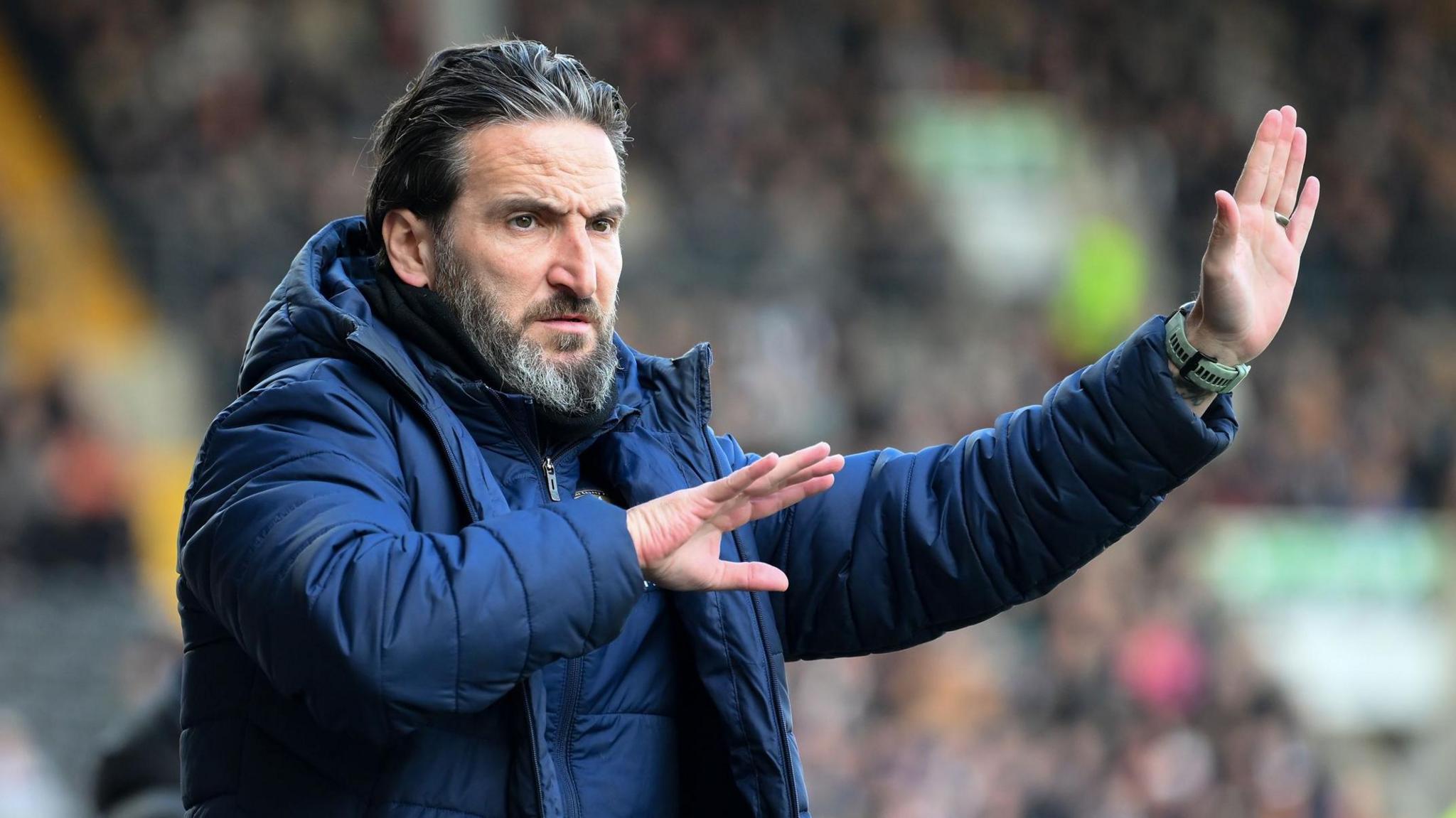 Martin Paterson signals instructions to his Notts County players from the sideline