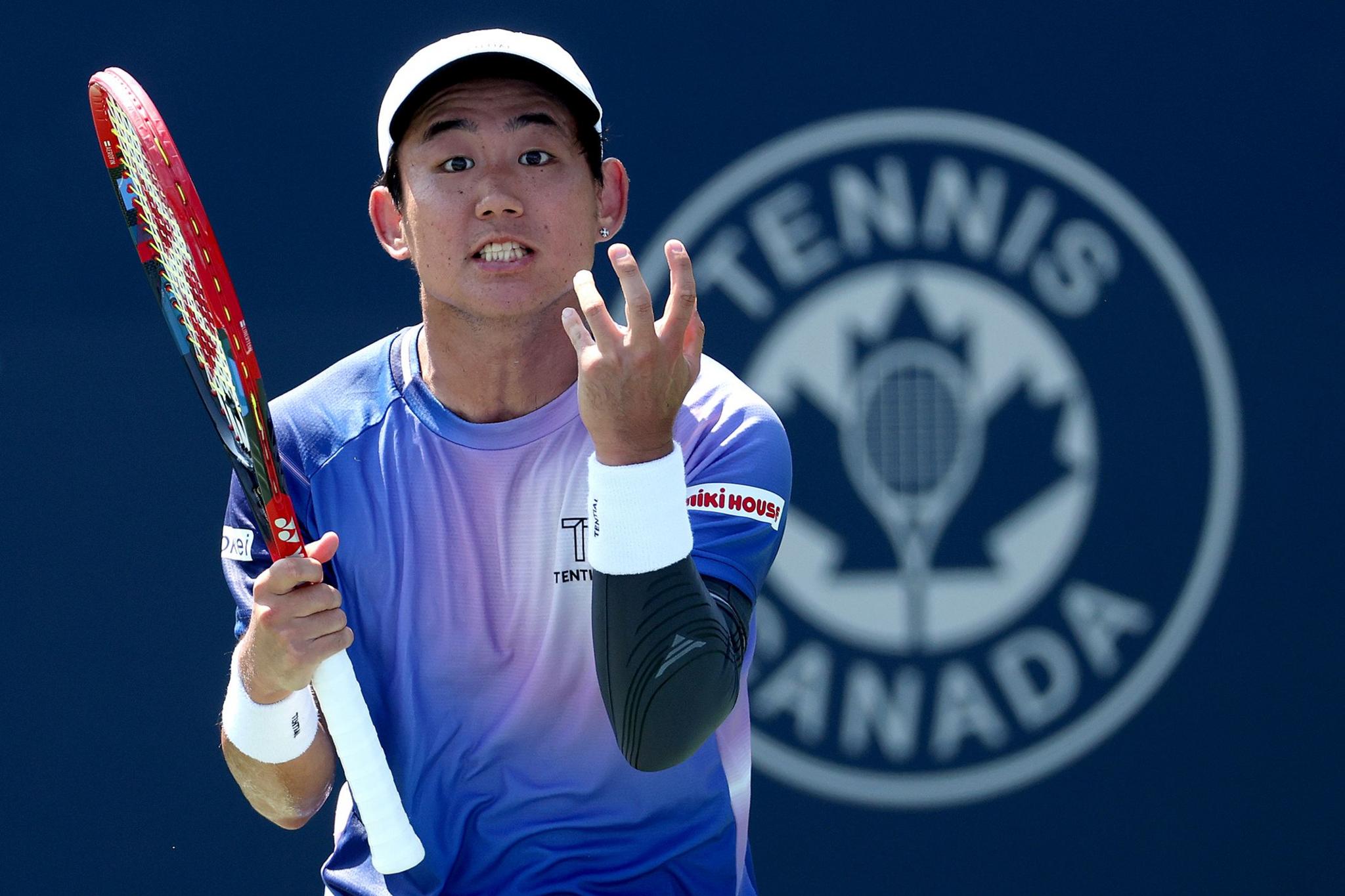 Japan's Yoshihito Nishioka reacts while playing United States' Ethan Quinn during the National Bank Open Presented by Rogers at Sobeys Stadium in Toronto, Ontario. Photo by Matthew Stockman