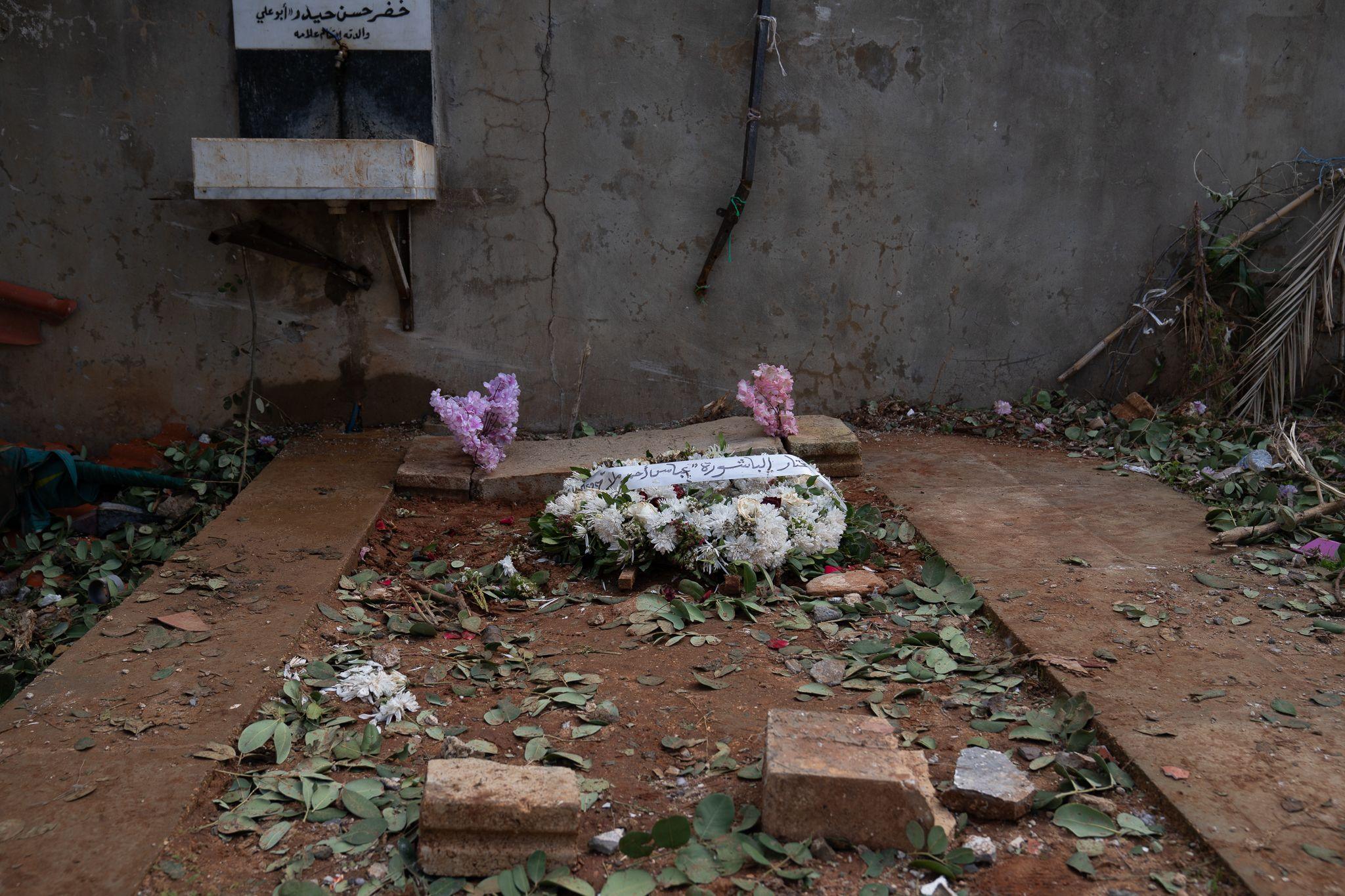 The temporary grave where Saeed, Naya and Tia were buried. The cemetery was badly damaged by an Israeli air strike.