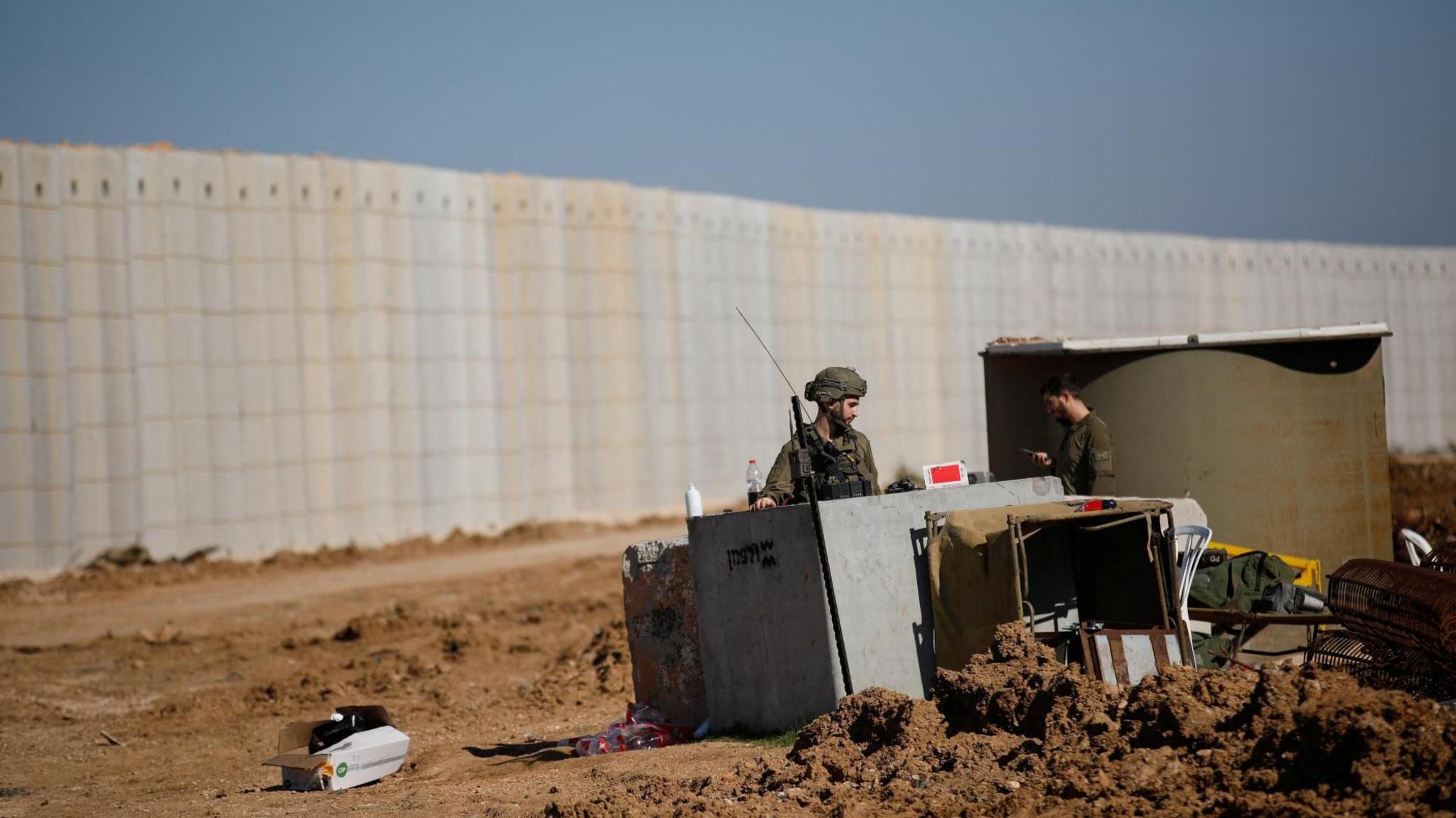 Israeli military forces stand near Israel's border with Lebanon, in northern Israel, earlier in January 