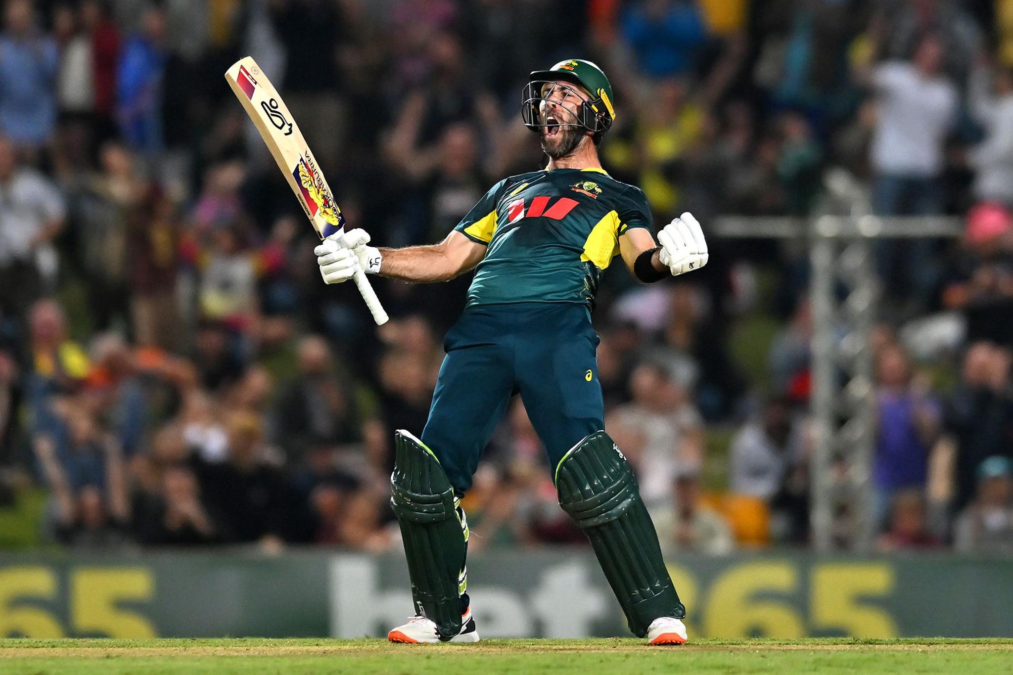 Australia's Glenn Maxwell celebrates scoring the match winning runs during game three of the Men's T20 International series versus South Africa at Cazaly's Stadium in Cairns, Australia. Photo by Albert Perez