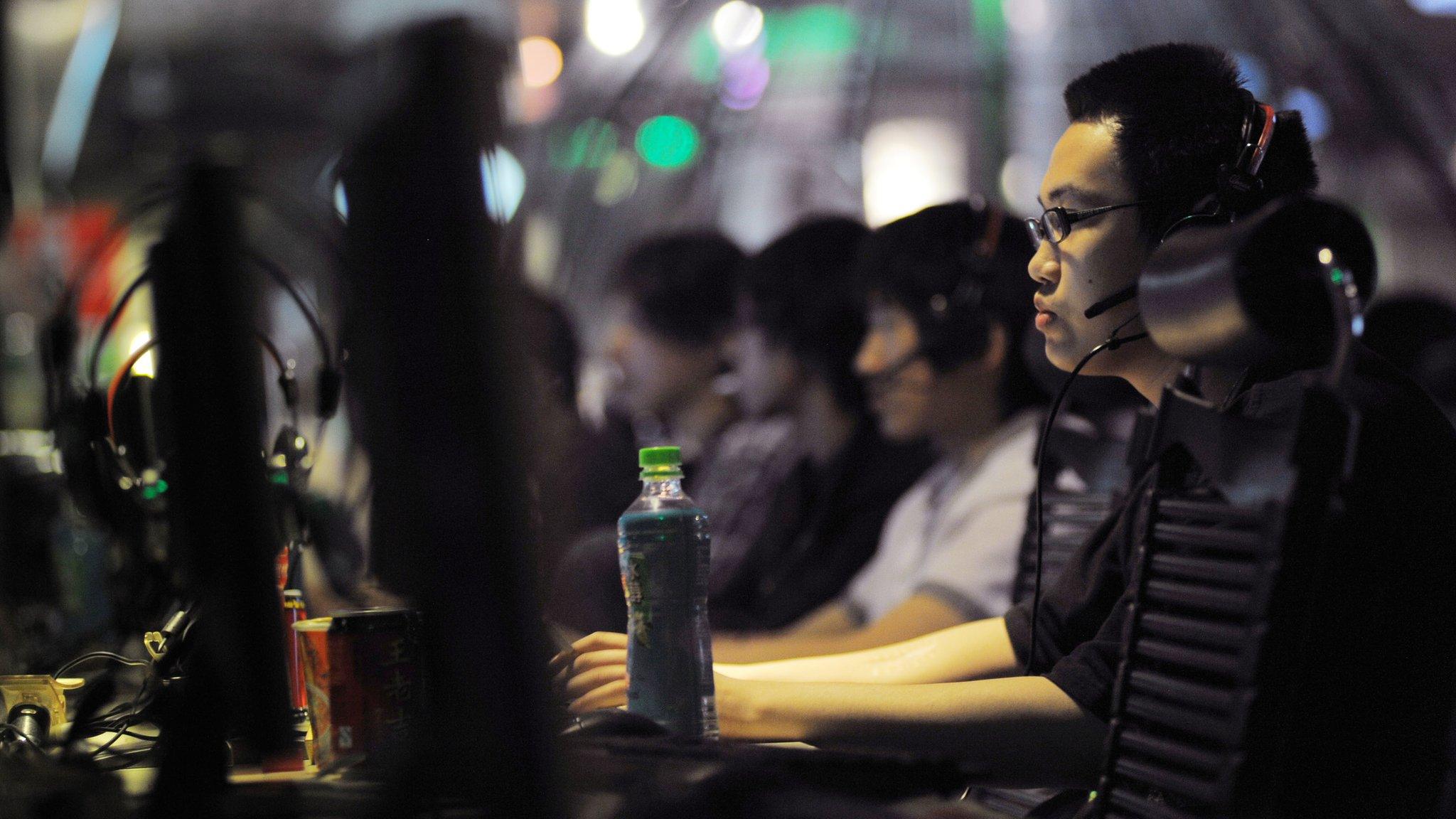 Consumers at an internet cafe in China