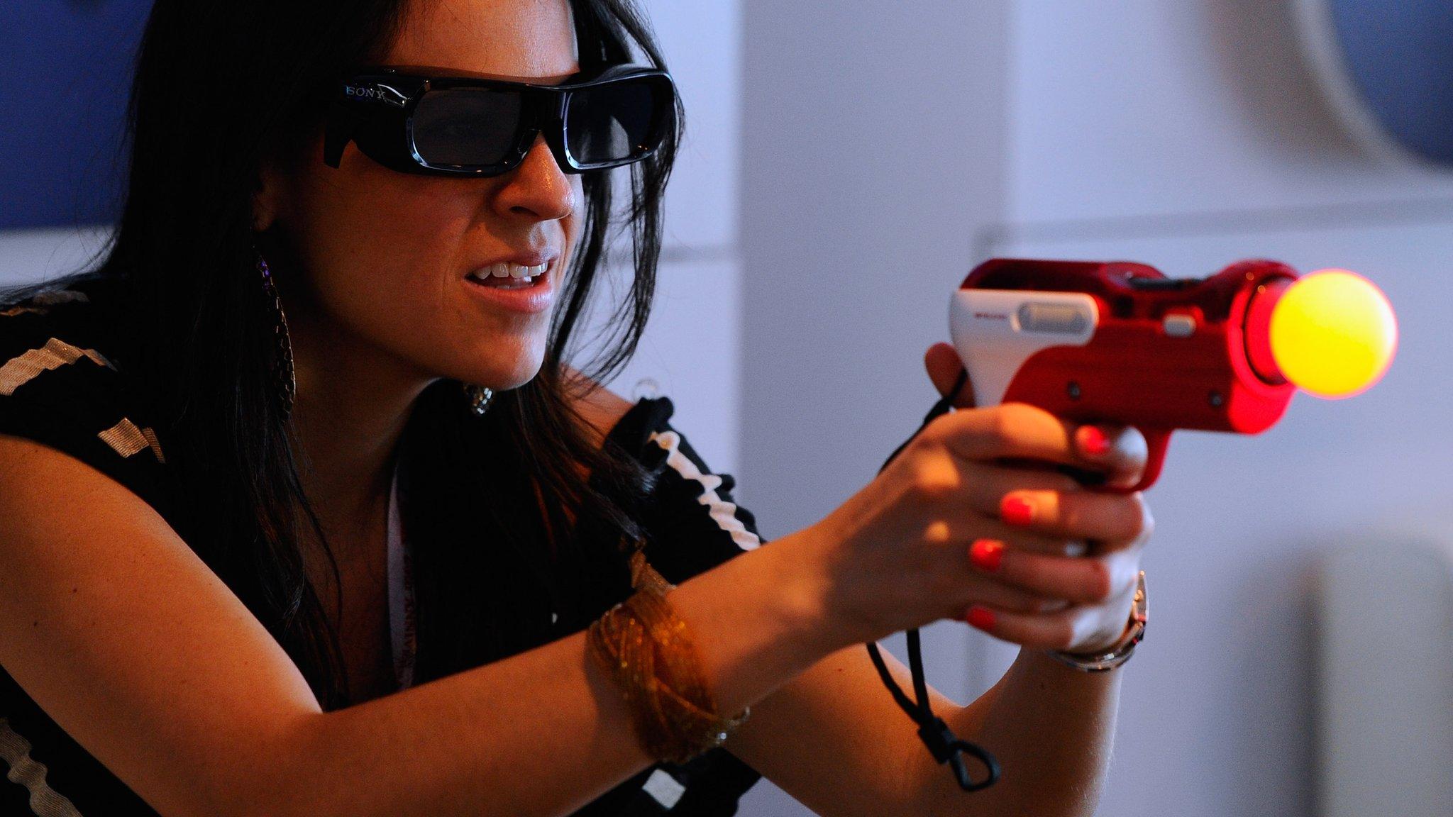 Woman at the Sony Playstation booth during the Electronic Entertainment Expo on 7 June, 2011