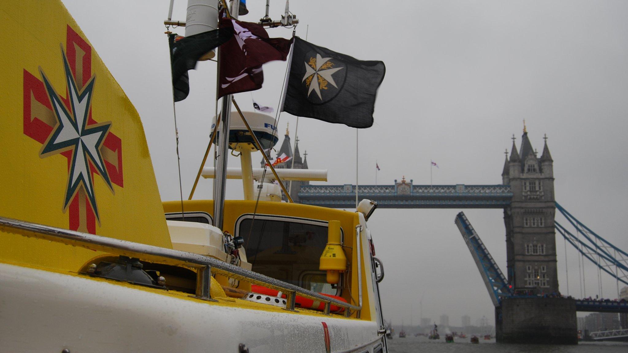 Guernsey marine ambulance Flying Christine III heading towards Tower Bridge as part of the Diamond Jubilee Pageant