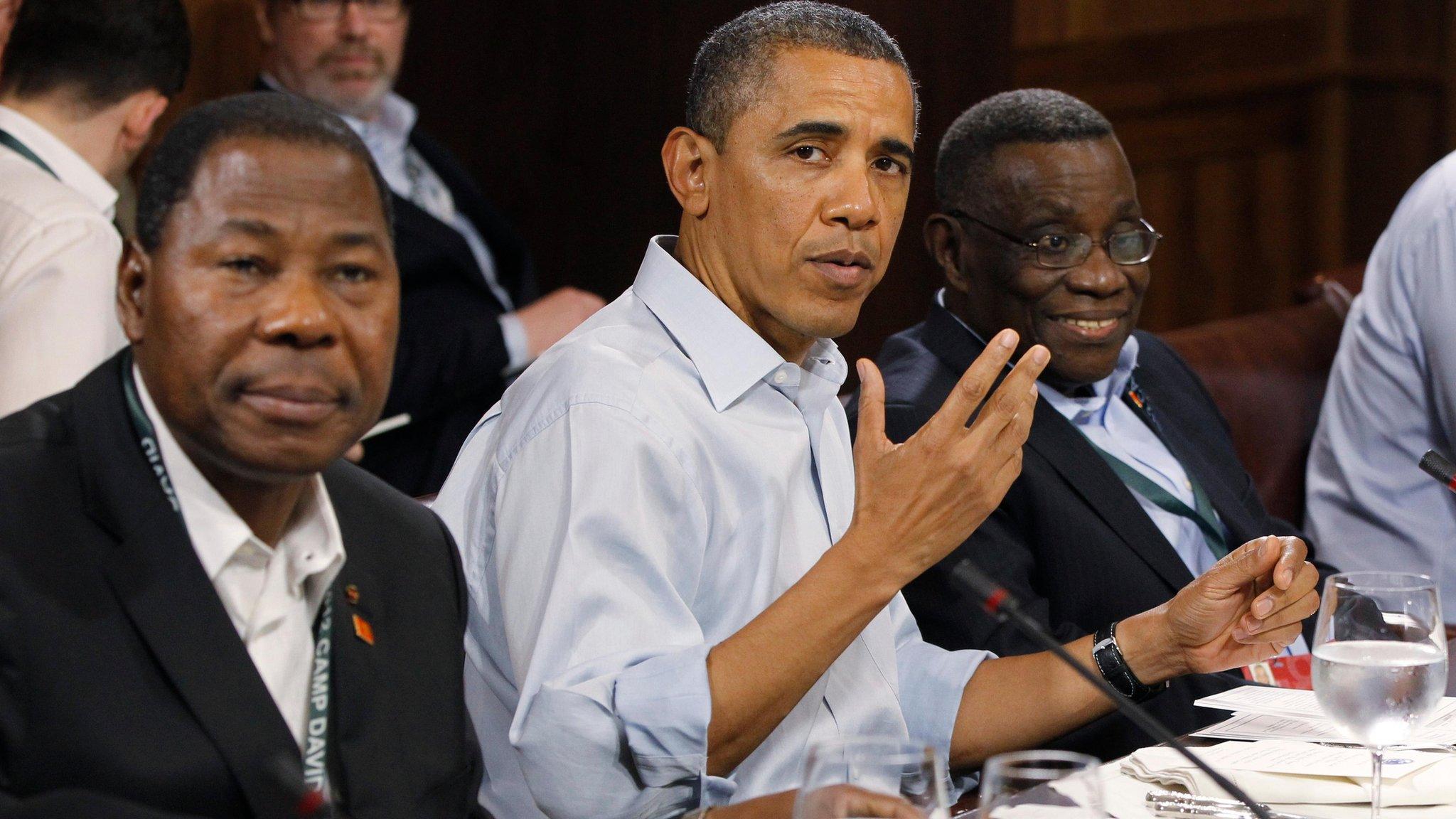 US President Barack Obama sits with Ghana President John Atta Mills, right, and President Yayi Boni of Benin during a luncheon on food security at the G8 Summit in May 2012