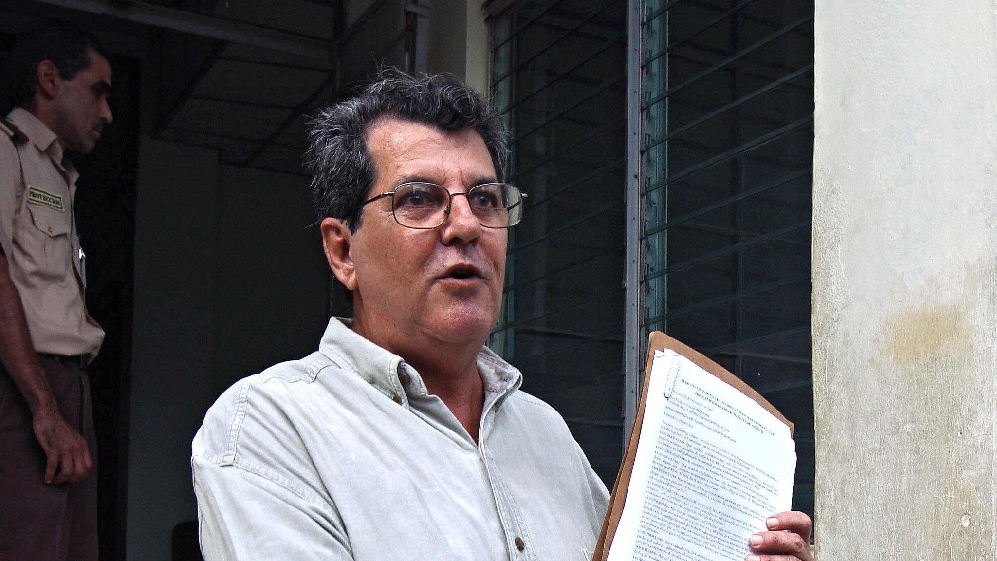 Cuban dissident Oswaldo Paya pictured in December 2007 while delivering to the National Assembly a letter requesting a general amnesty for political prisoners (file pic)