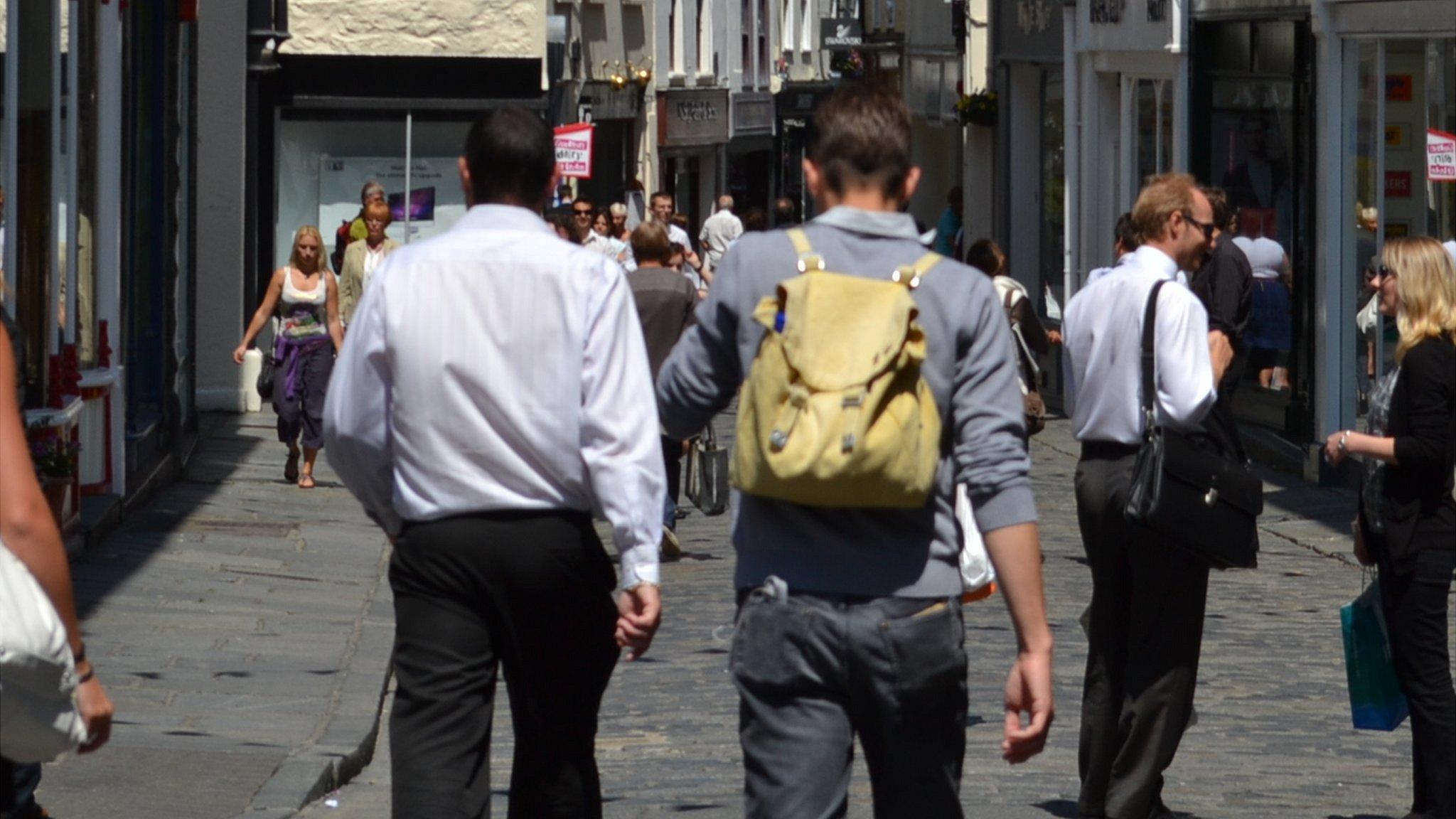 People walking through the High Street in St Peter Port, Guernsey