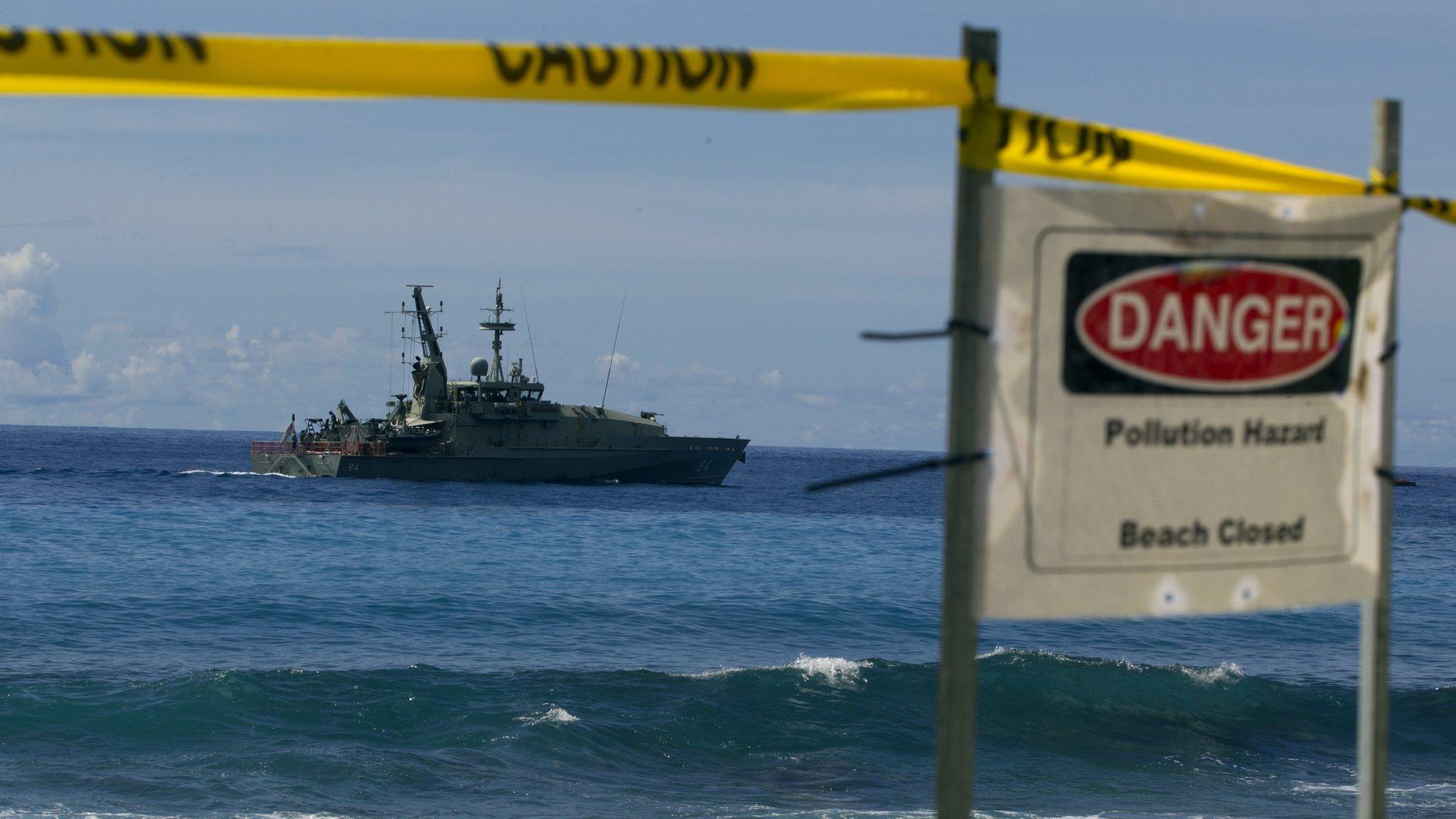 An Australian navy vessel sails past Christmas Island on 29 February 2012