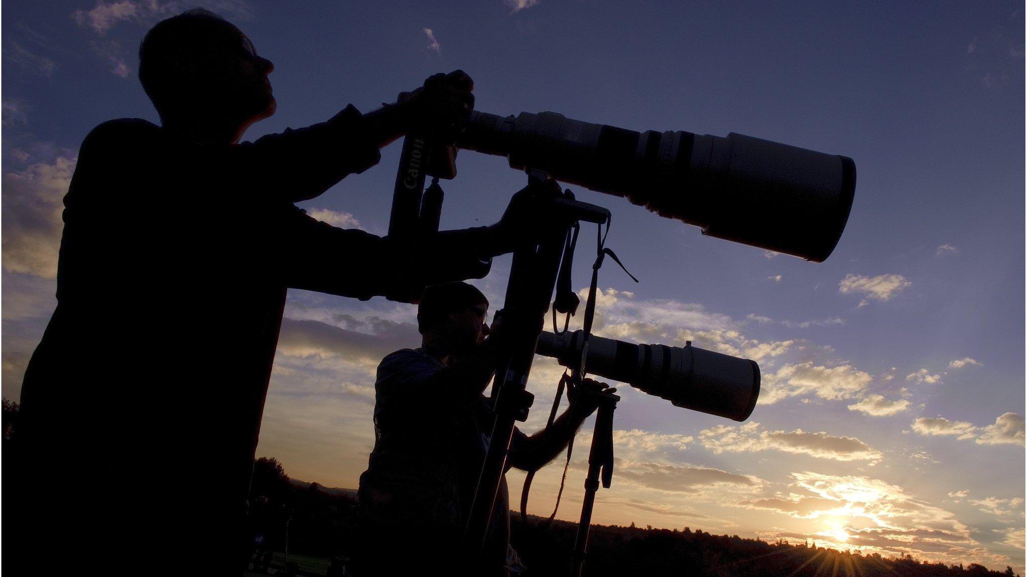 Photographers with long lenses