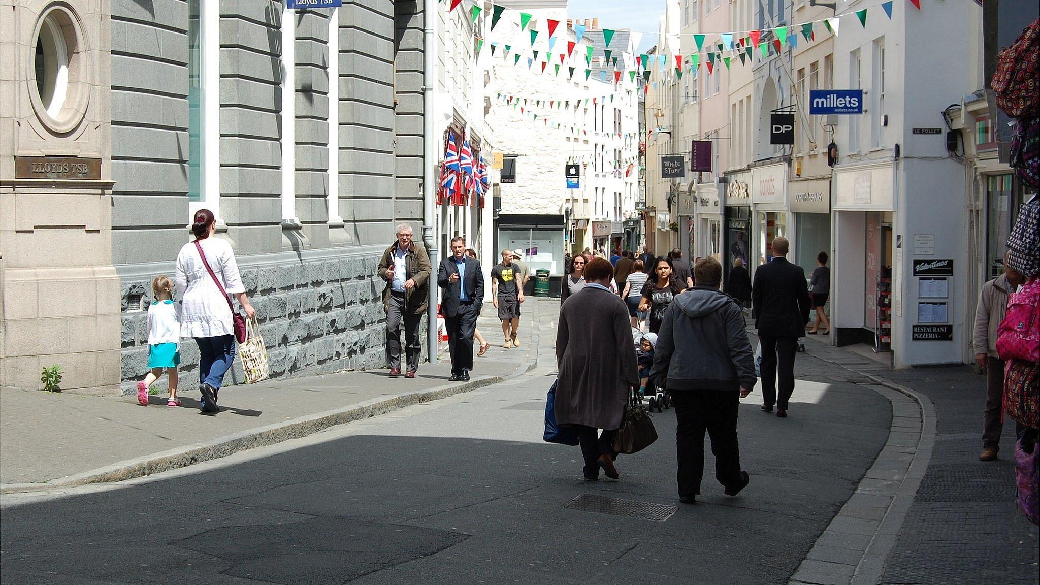 Shops and shoppers in Le Pollet in St Peter Port, Guernsey