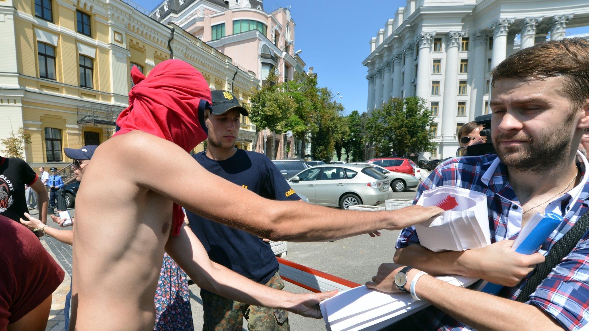 Masked nationalists v gay rights activists in Kiev