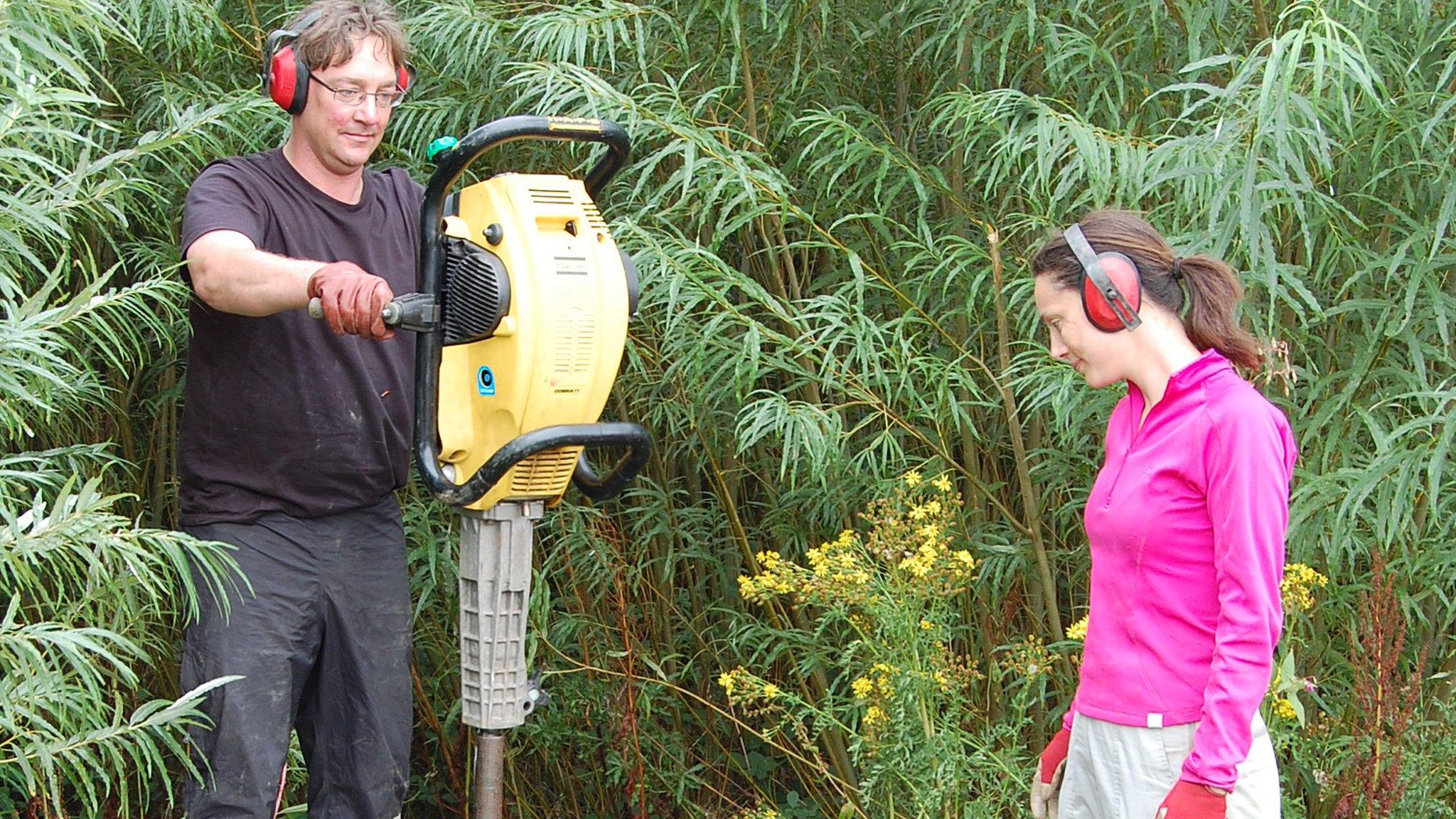 Dr Niall McNamara and Dr Rebecca Rowe demonstrate how "Kevin", an adapted road-breaking, helps them collect soil samples