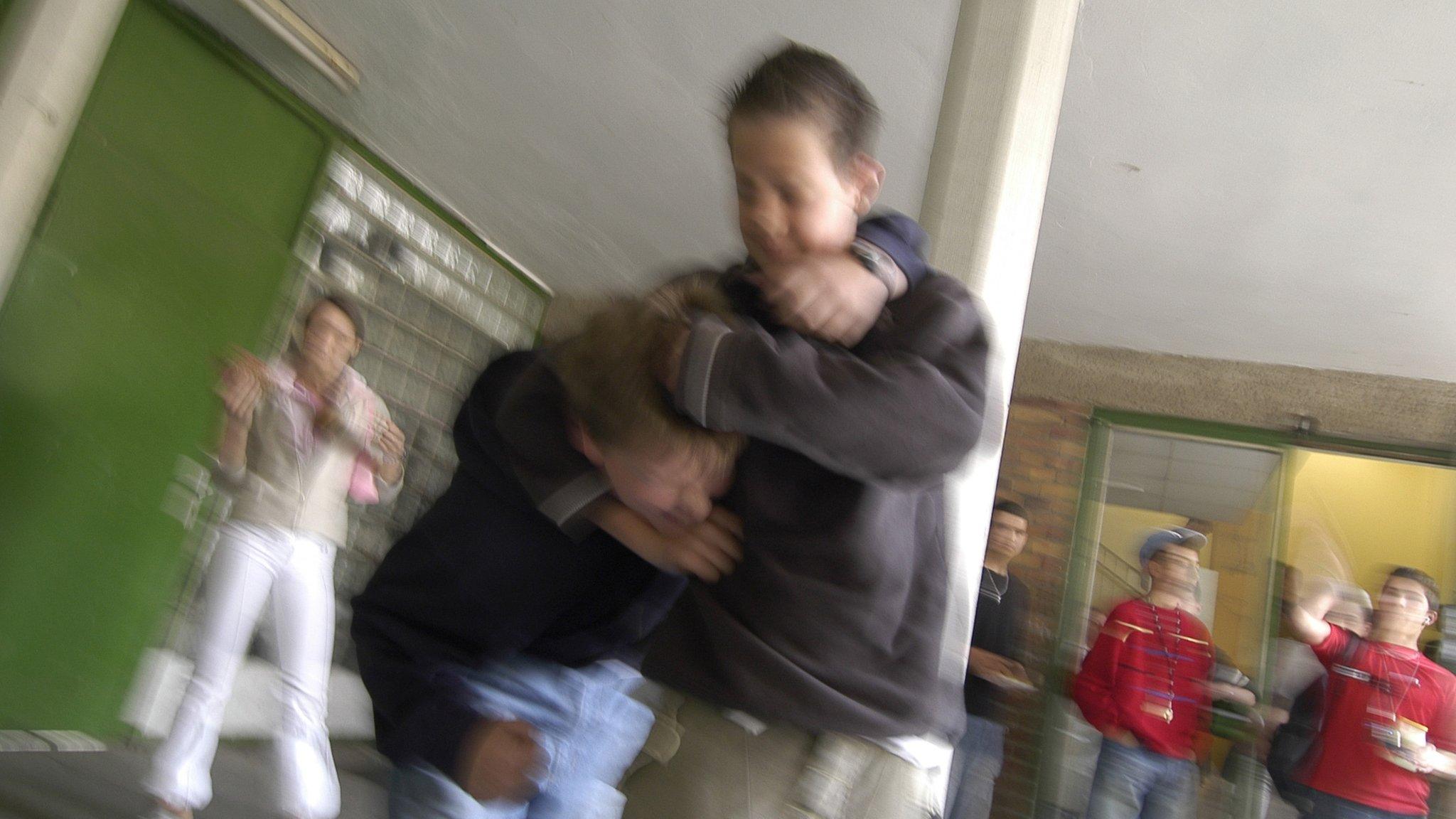 Children fighting - posed by models