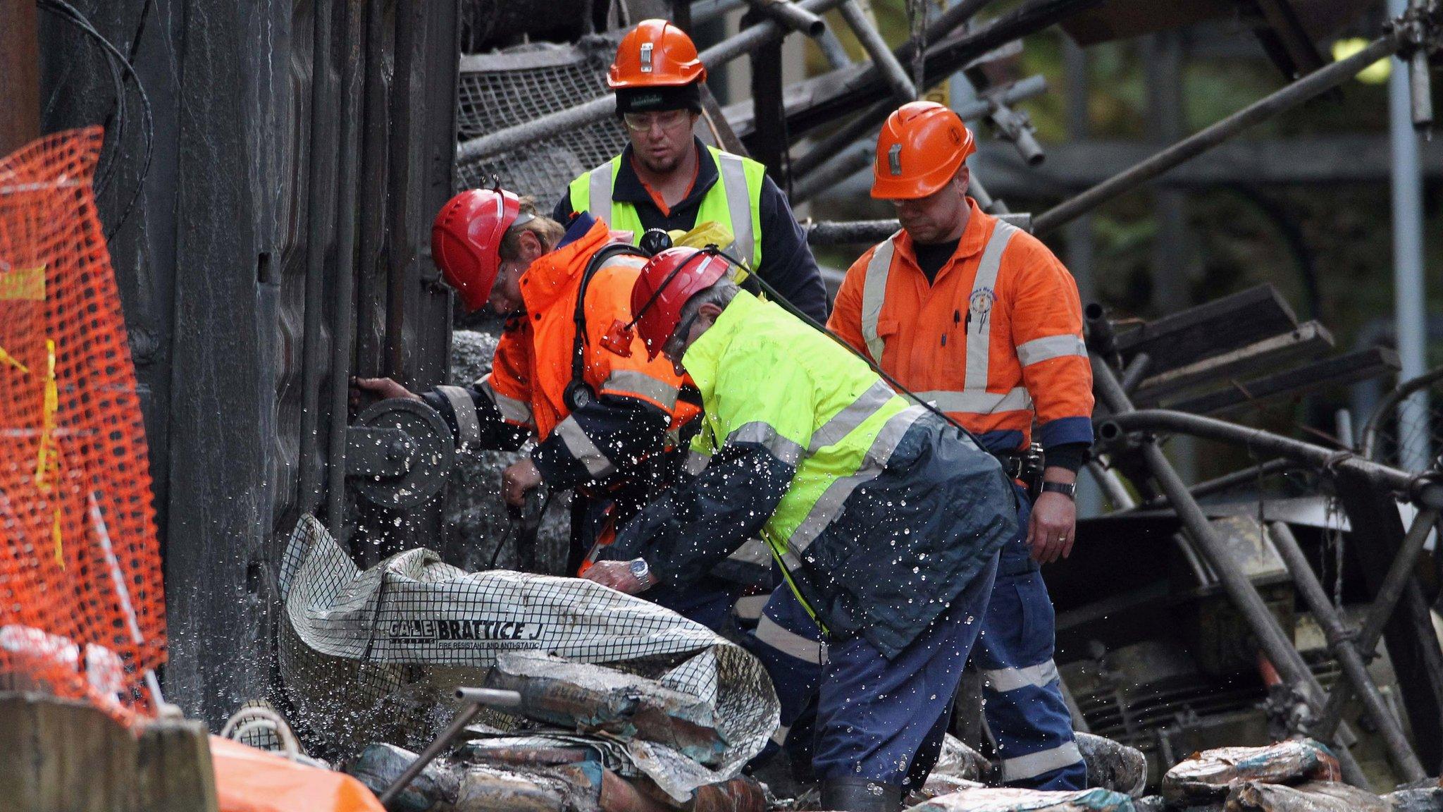 Rescue staff removing debris at the Pike River mine in New Zealand, 28 June 2011