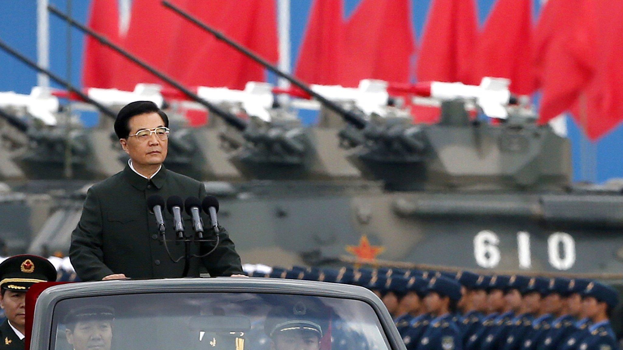 Hu Jintao inspects People"s Liberation Army soldiers at a camp in Hong Kong, 29 June 2012