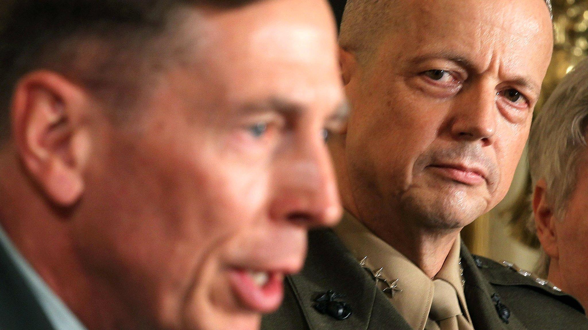 April 2011 file picture of David Petraeus (L) and Gen John Allen at the White House