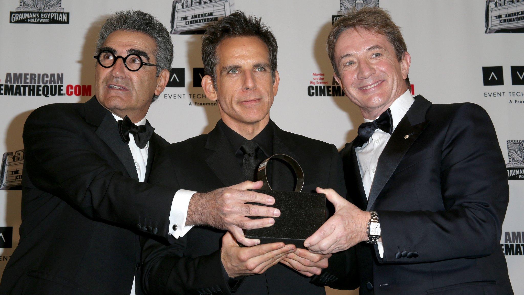 Actors Eugene Levy, honouree Ben Stiller and Martin Short pose with the American Cinematheque Award at the the 26th American Cinematheque Award Gala.