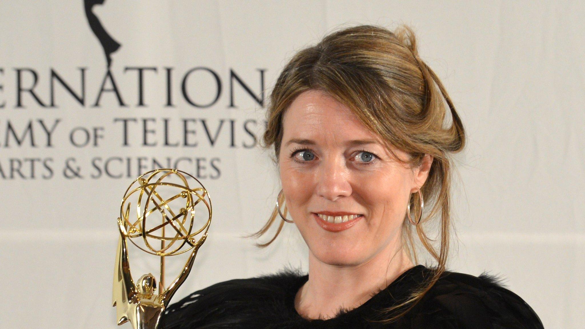 Black Mirror's executive producer Annabel Jones holds her trophy at the 40th International Emmy Awards in New York.