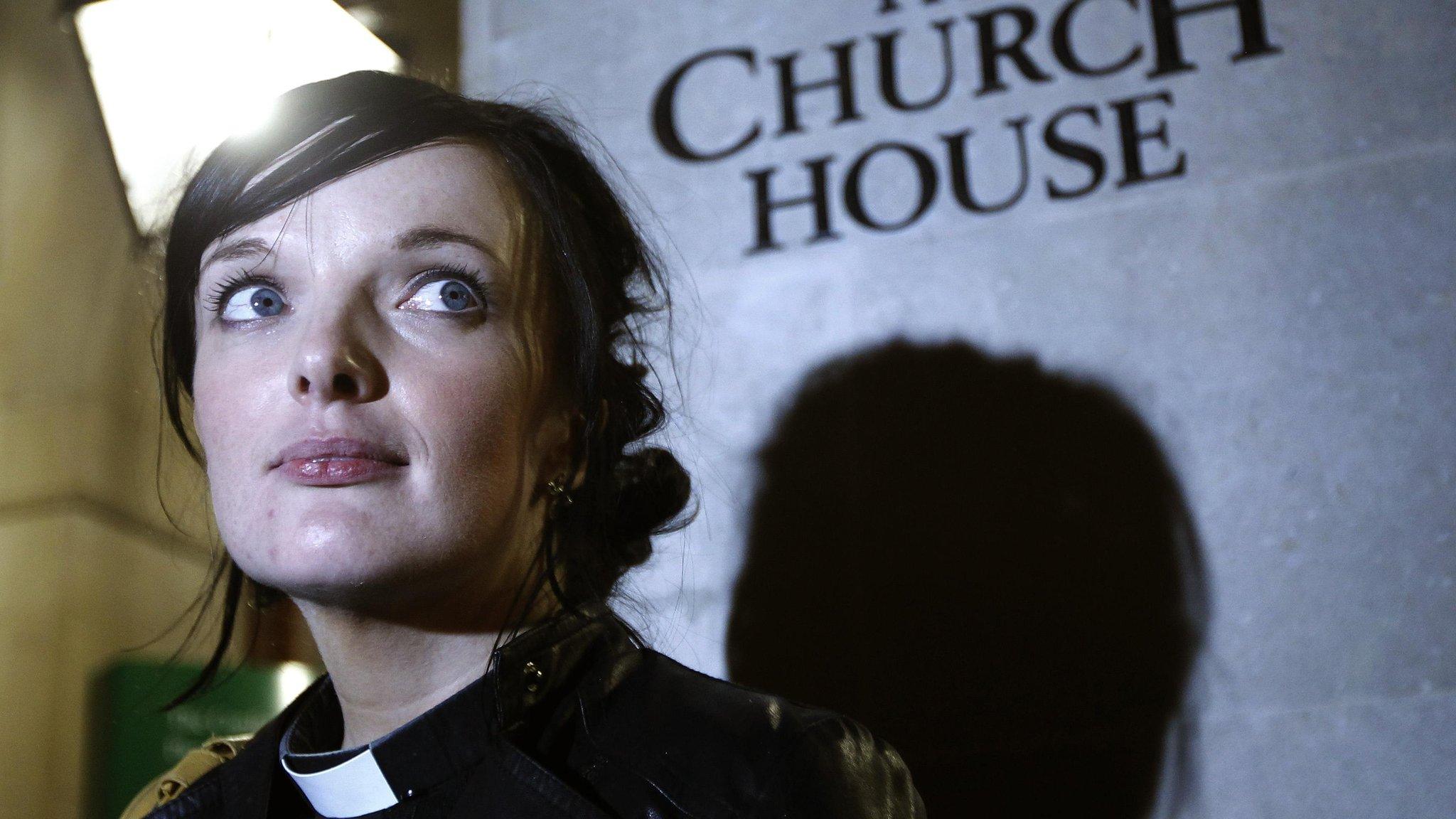 Reverend Sally Hitchiner leaves after the vote for women bishops failed during the Synod at Church House in London