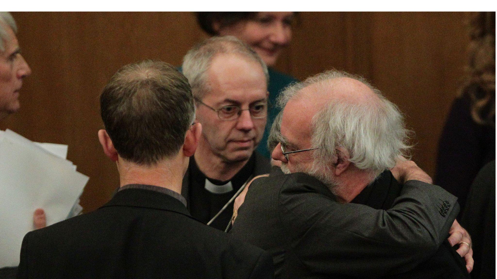 Rowan Williams and his successor Justin Welby after the synod rejected the women bishops measure.