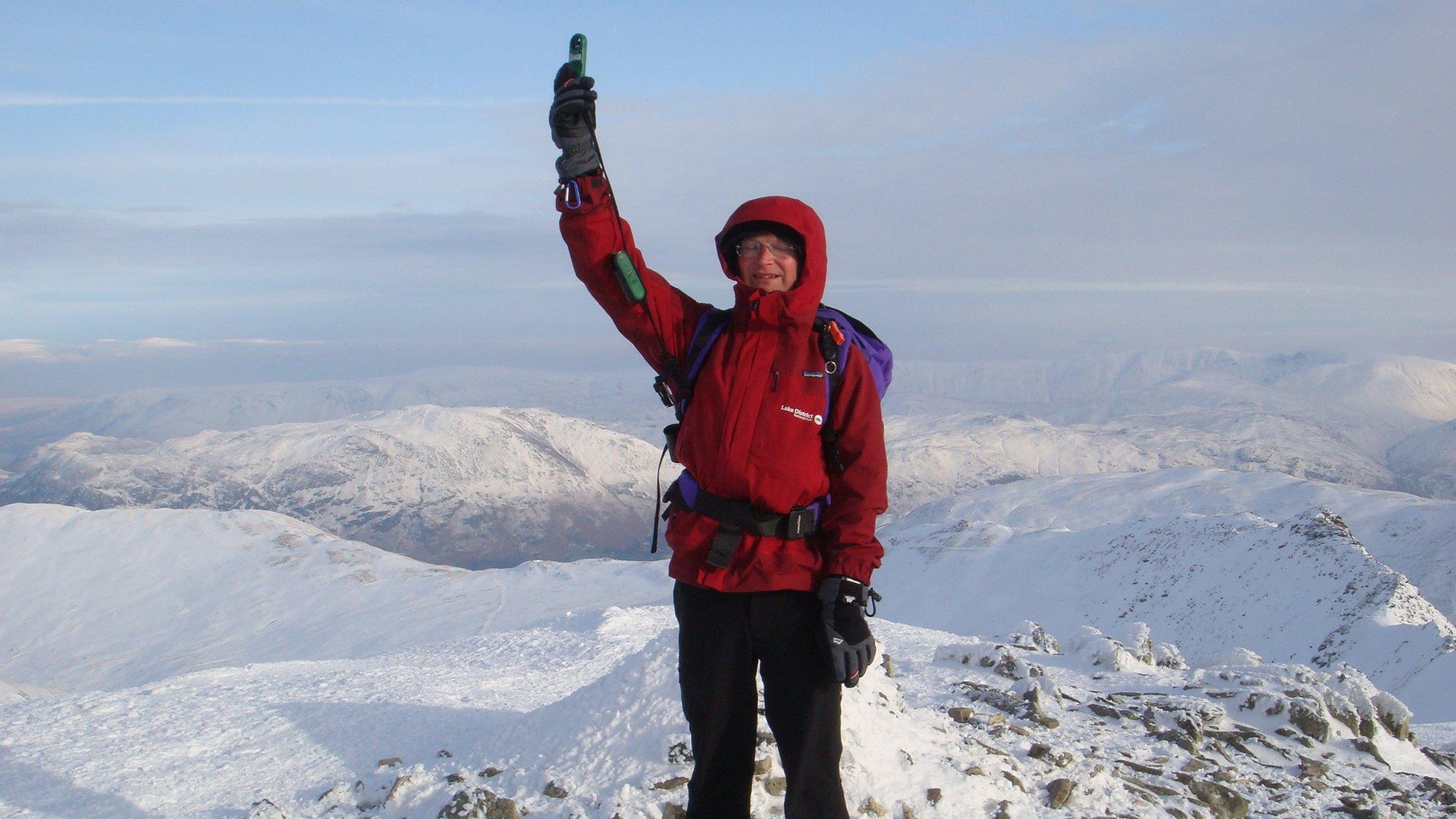 Jon Bennett doing a weather check on Helvellyn