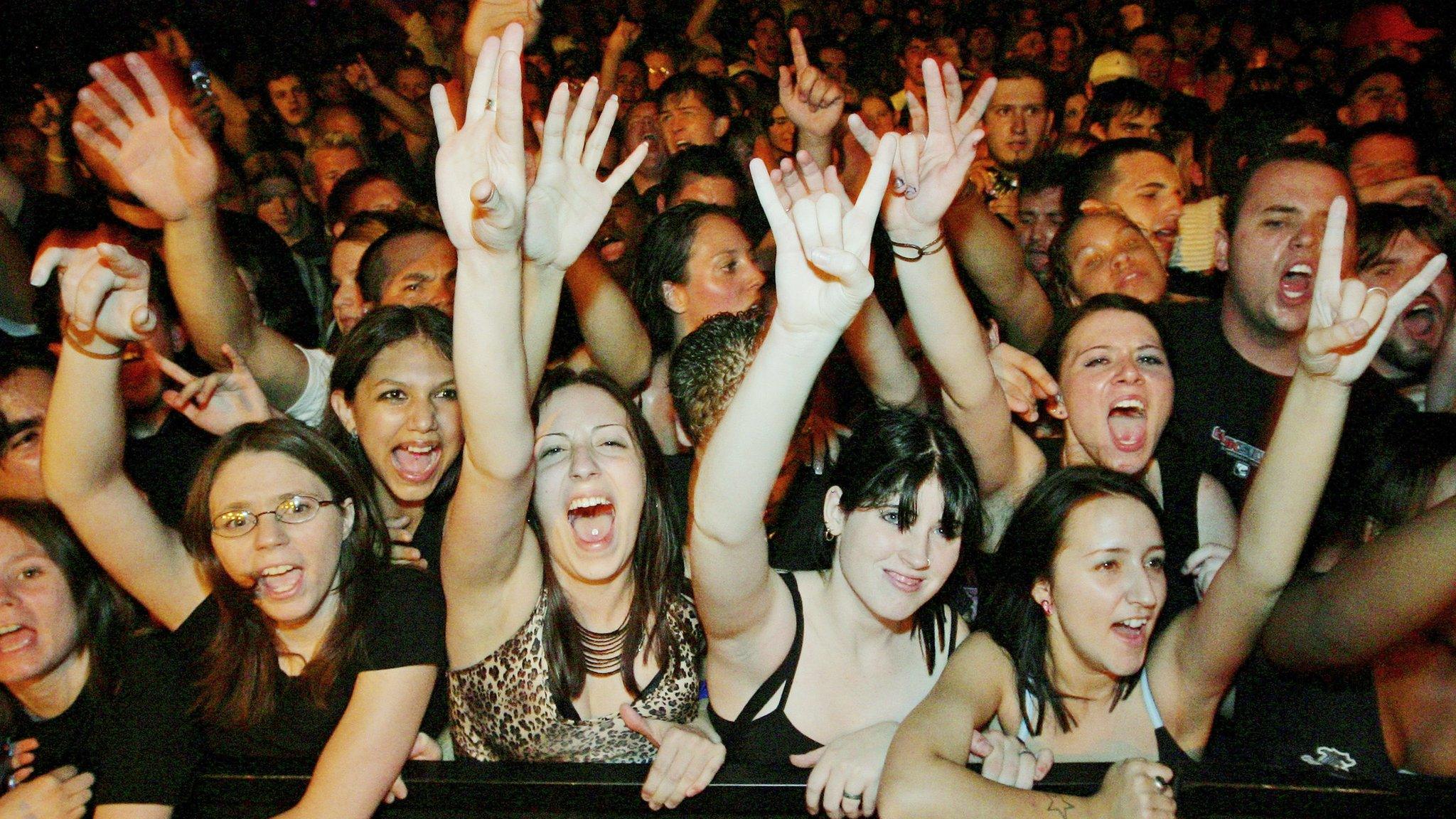 Crowd cheering at gig