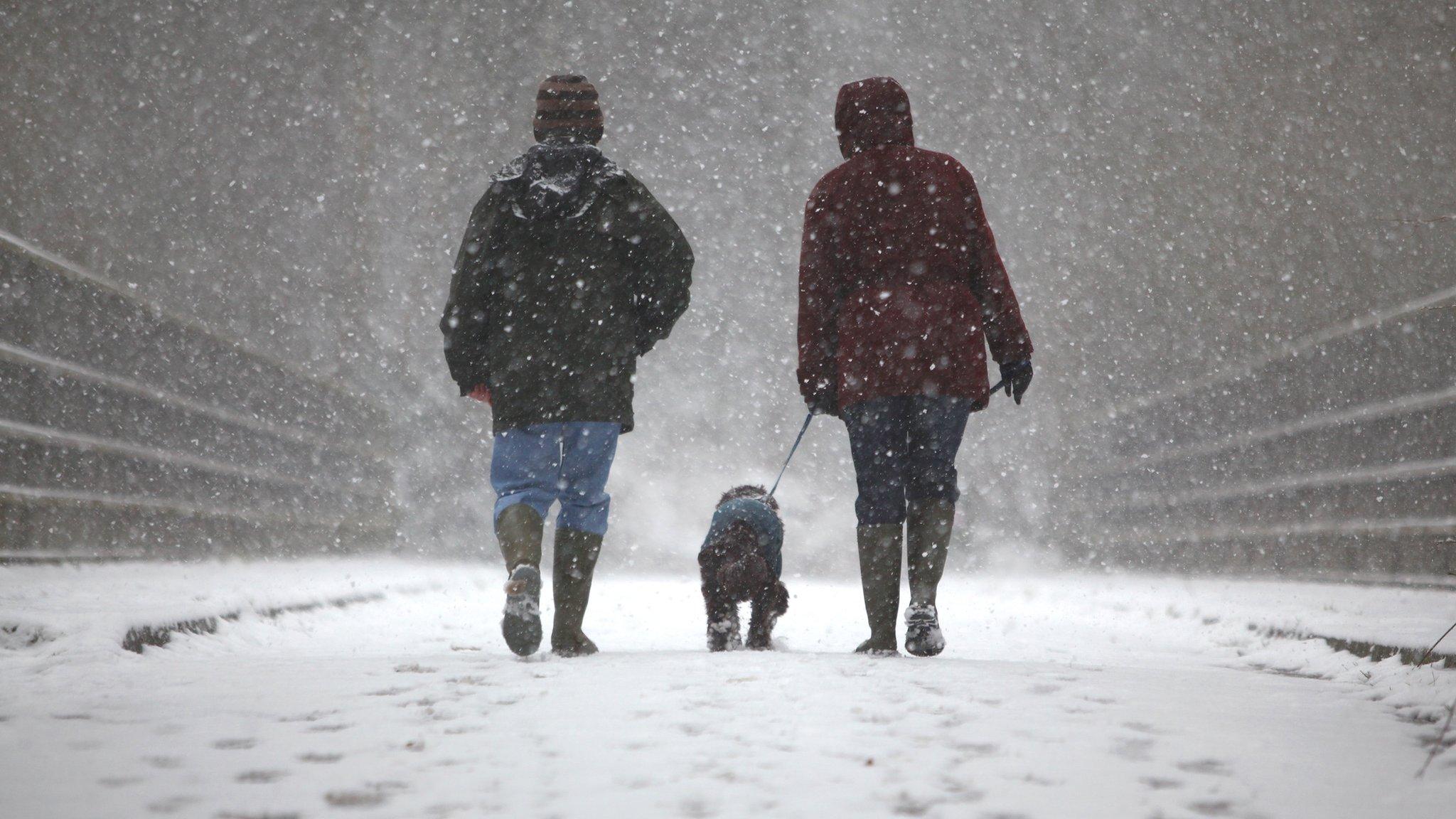 Woman and man in snow