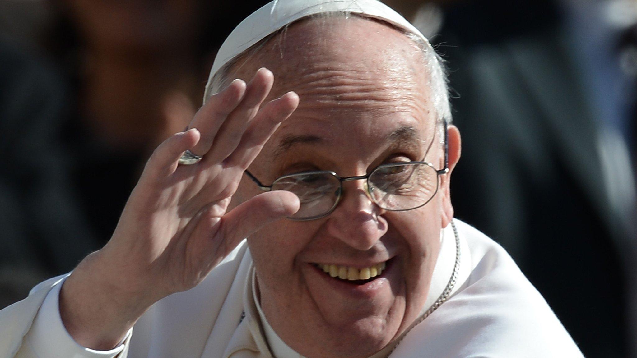 Pope Francis waving