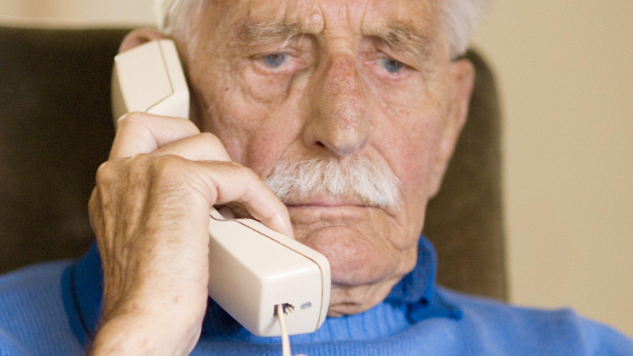 elderly man on the phone