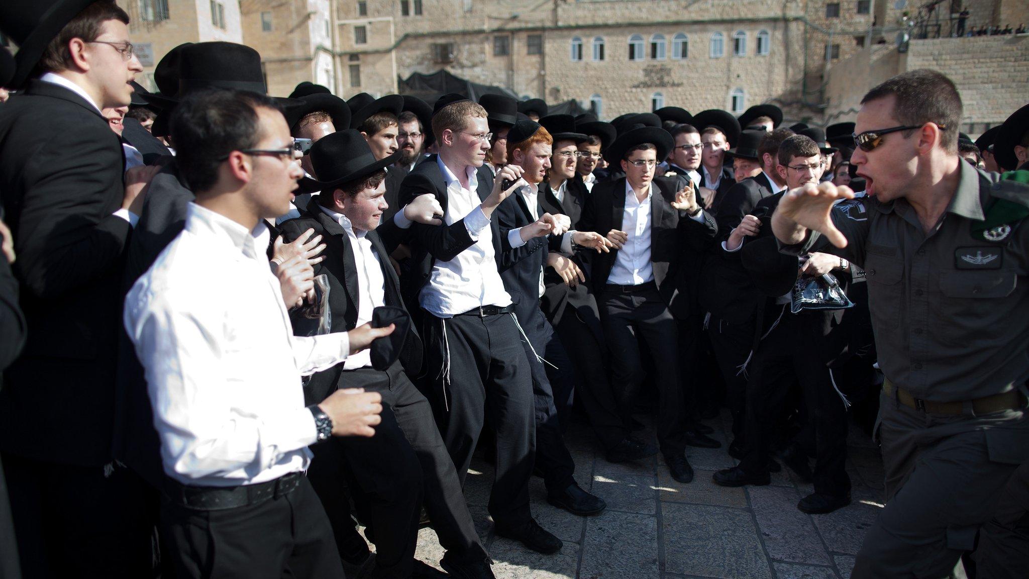 Ultra-Orthodox protesters clash with police at the Western Wall in Jerusalem on 10 May 2013