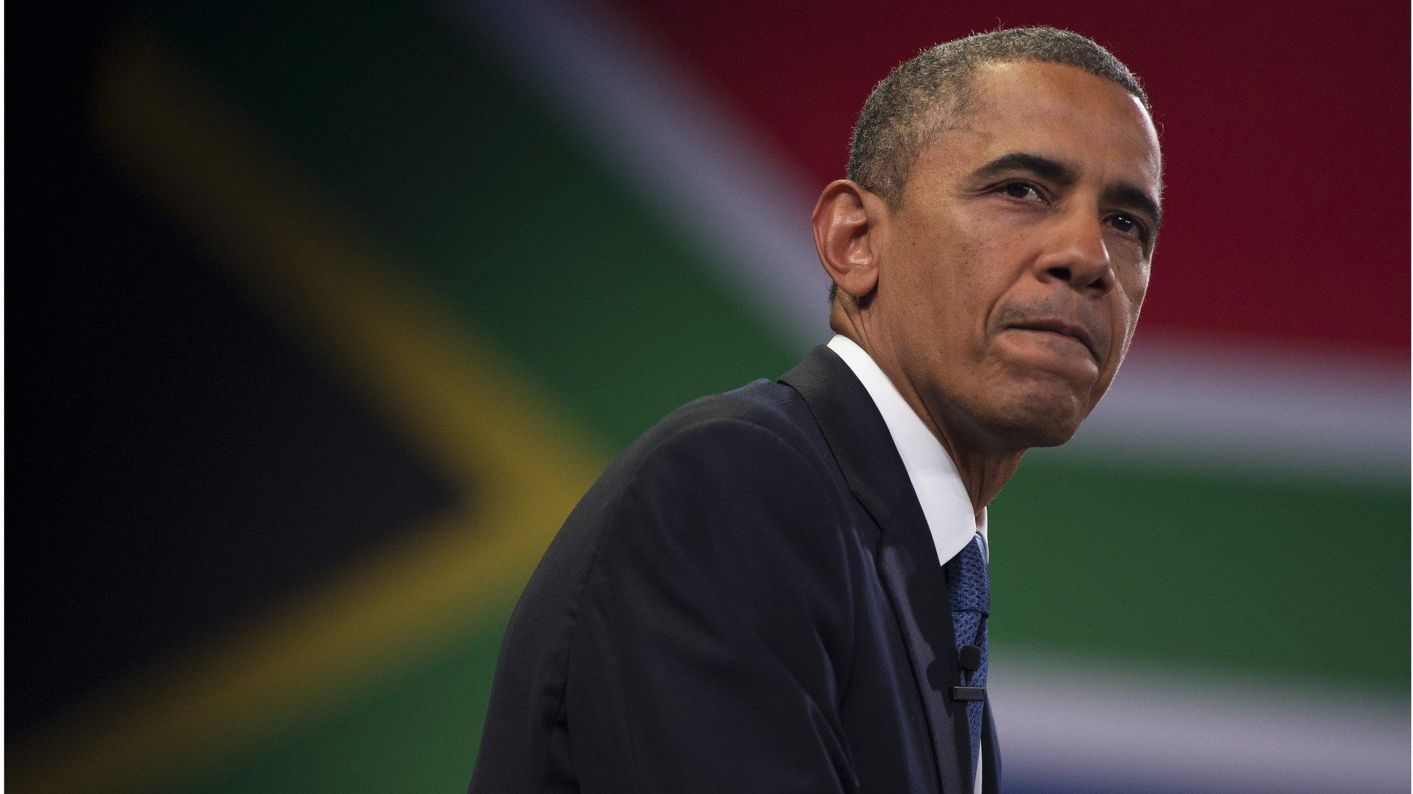 US President Barack Obama pauses during a town hall meeting with young African leaders at the University of Johannesburg Soweto (June 29, 2013)