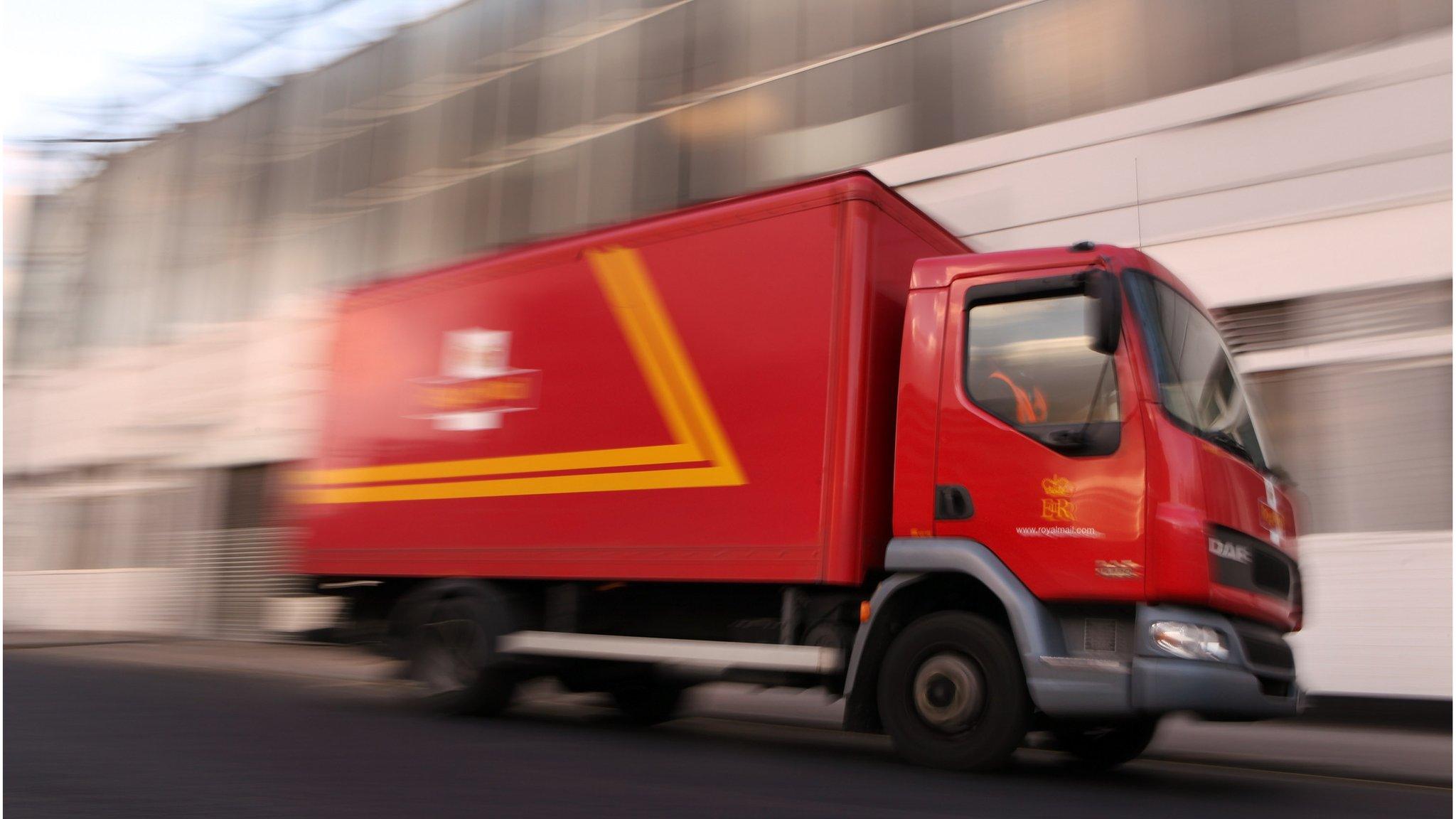 A Royal Mail van leaves the Mount Pleasant sorting office