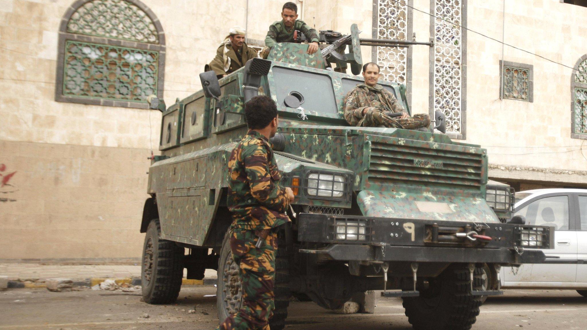 Police troopers secure a street leading to the British embassy in Sanaa on 5 August 2013