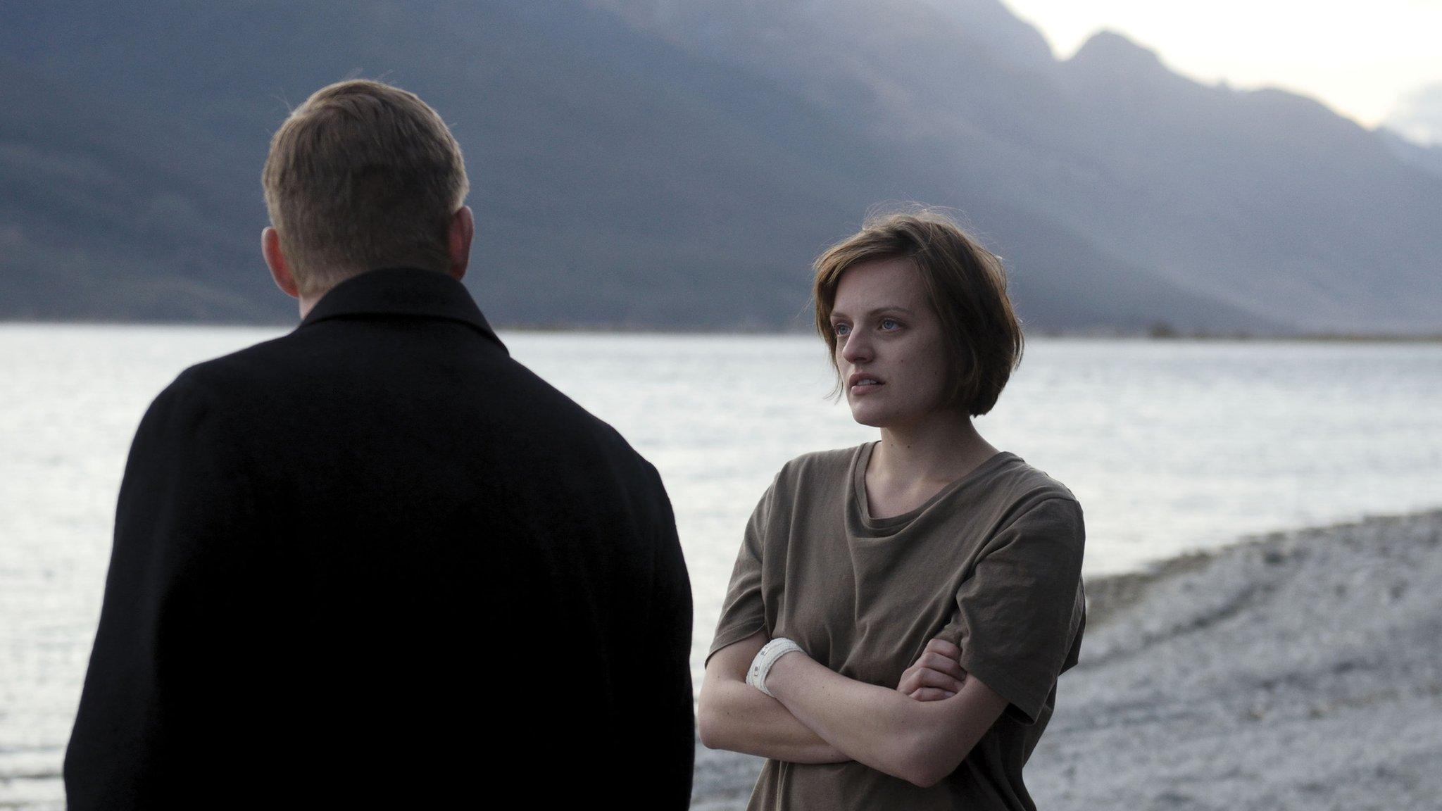 Elisabeth Moss by the water in Top of the Lake