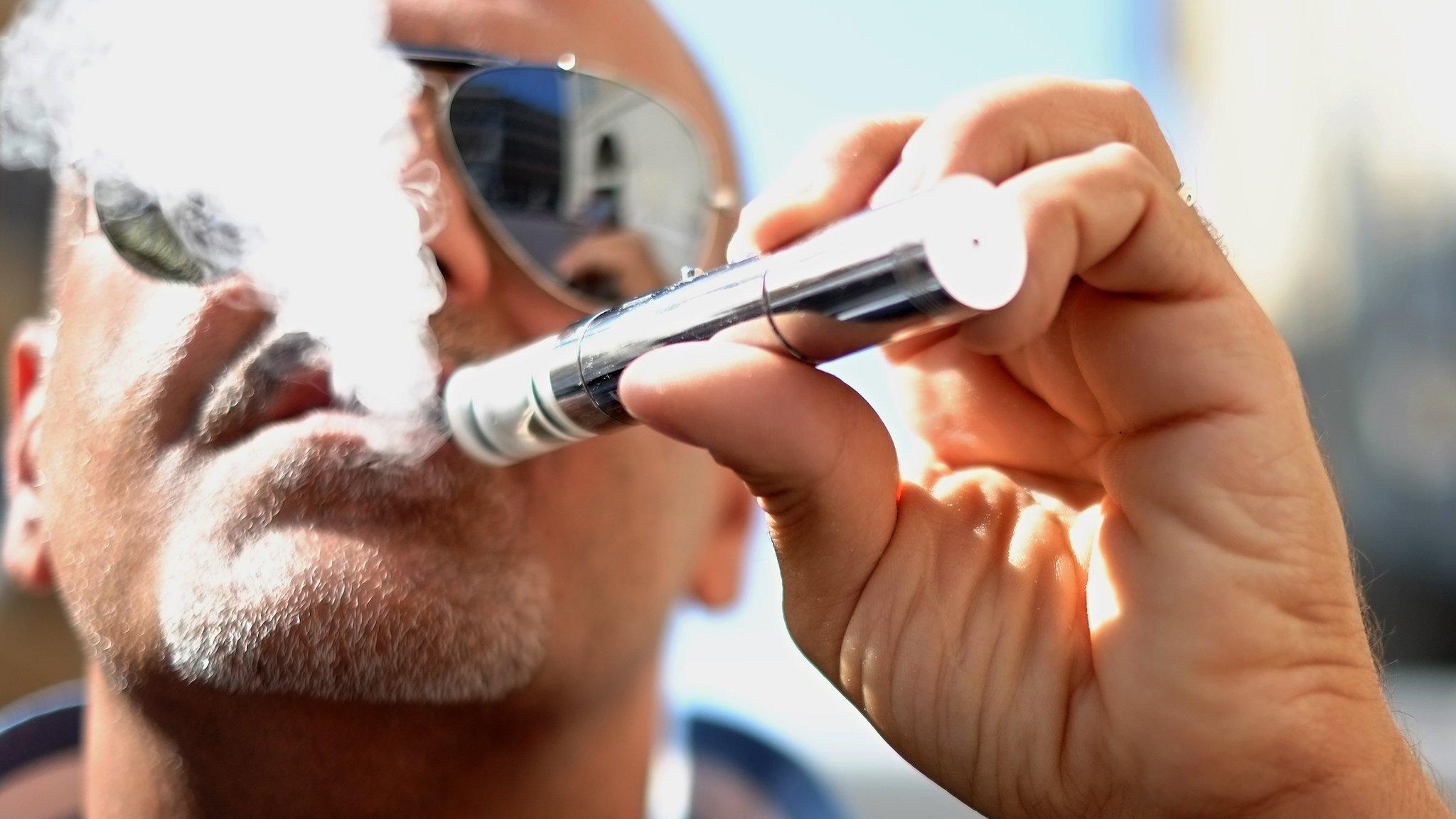 Man smoking electronic cigarette