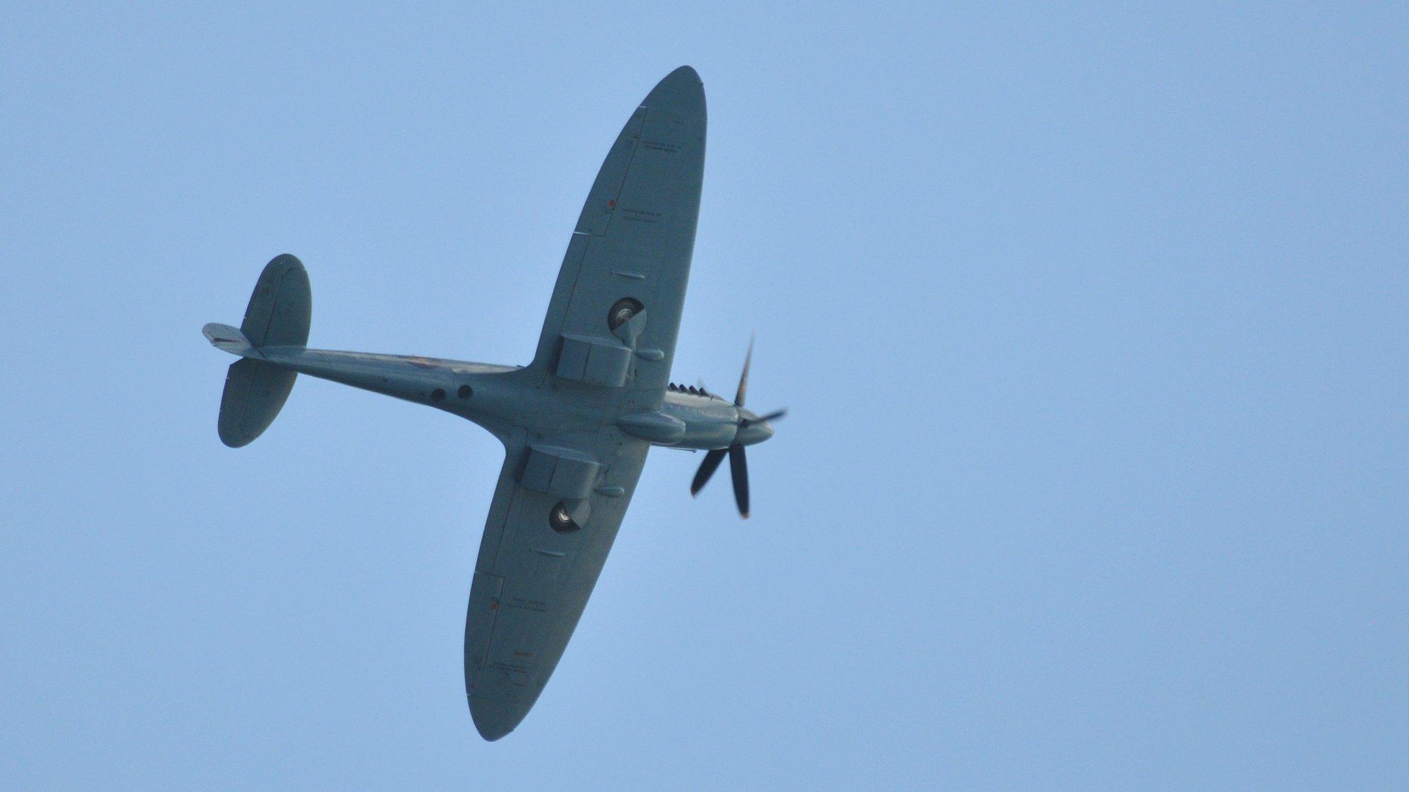 A Spitfire in flight over Guernsey in 2012