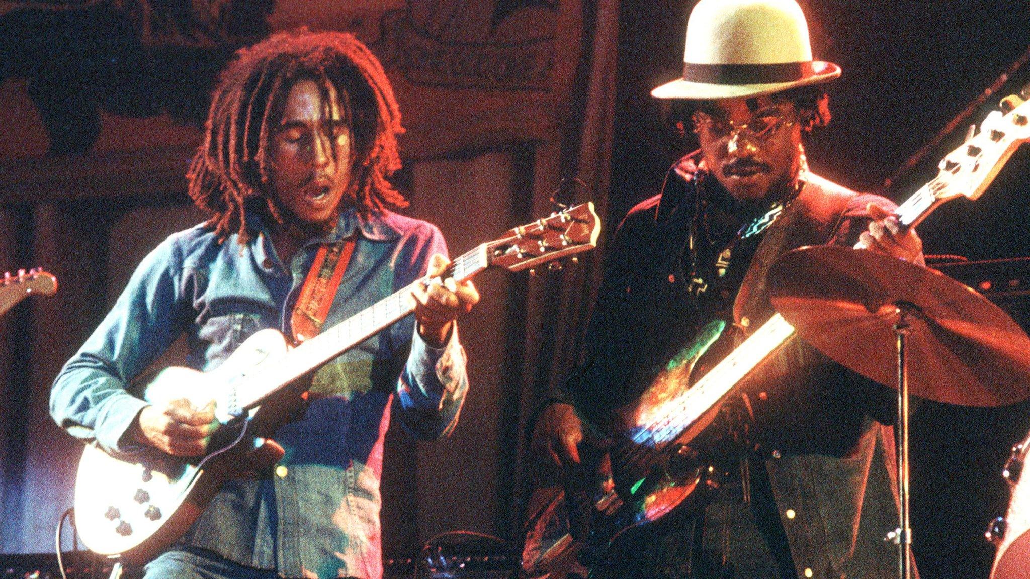 Bob Marley (left) and Aston "Family Man" Barrett