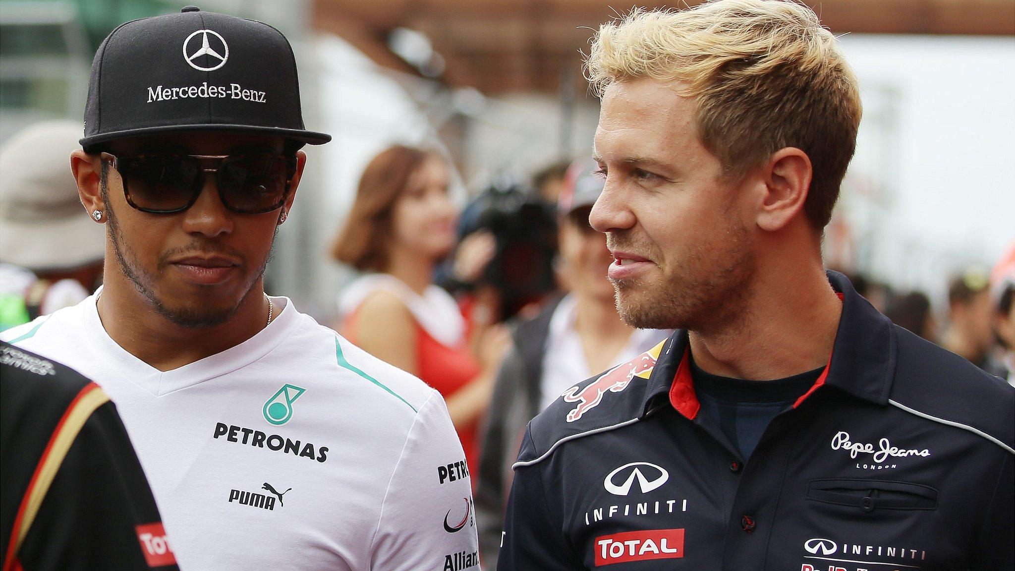 Lewis Hamilton (left) with Sebastian Vettel