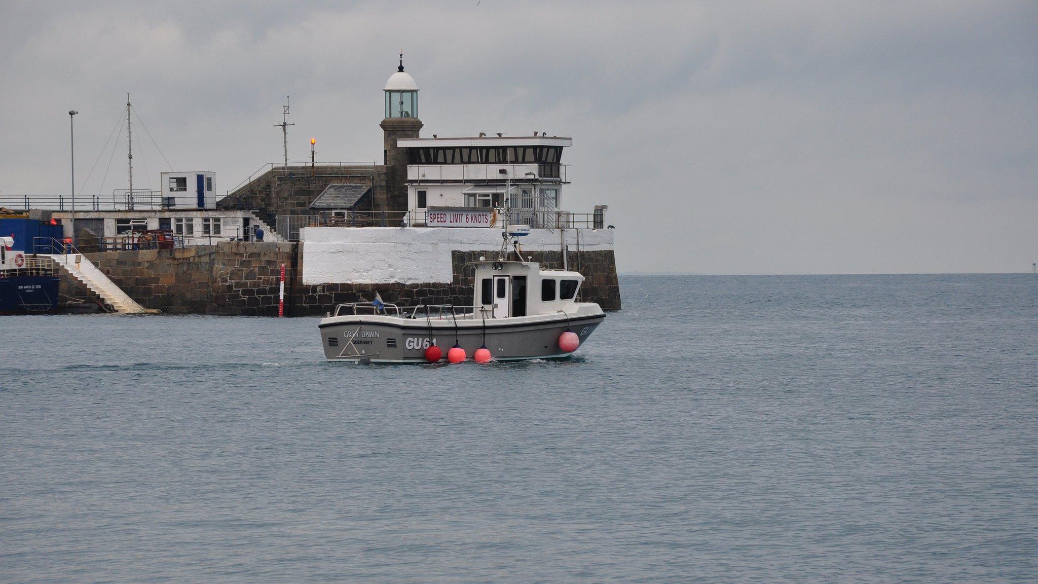 Boat leaving St Peter Port harbour